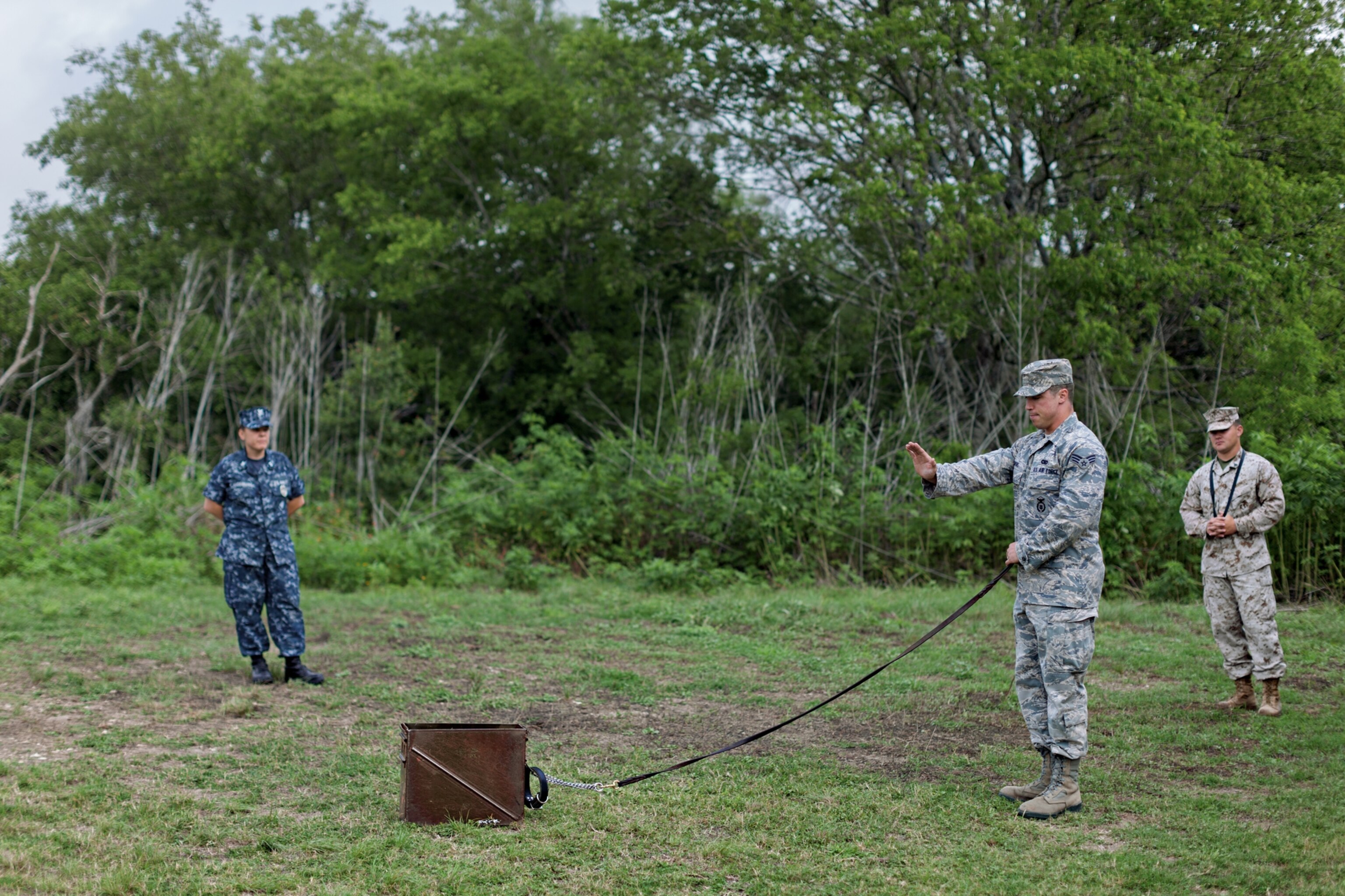 Dog handlers learning leash skills and hand signals at Lackland Air Force Base