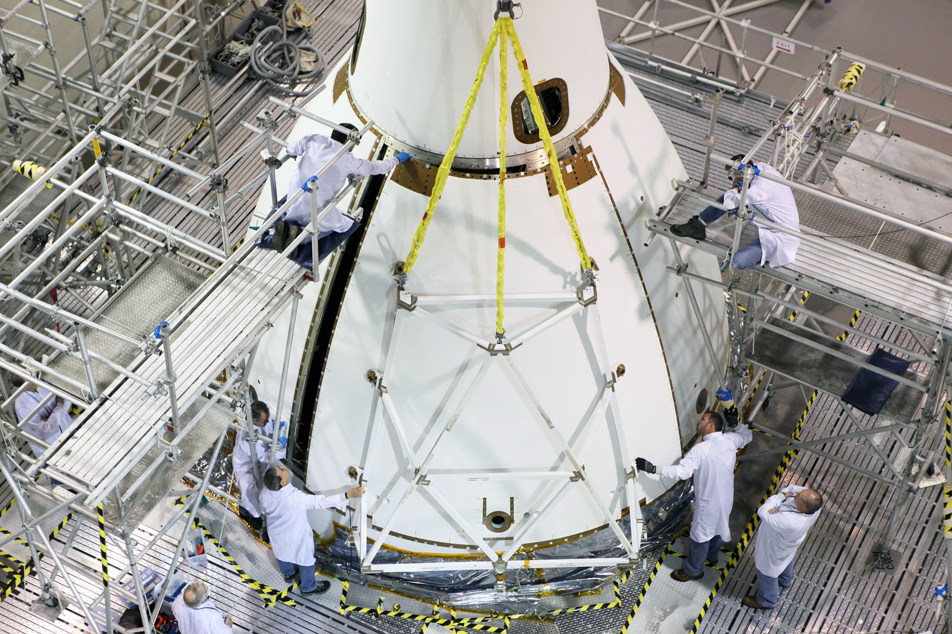 technicians working on Orion's Launch Abort System.