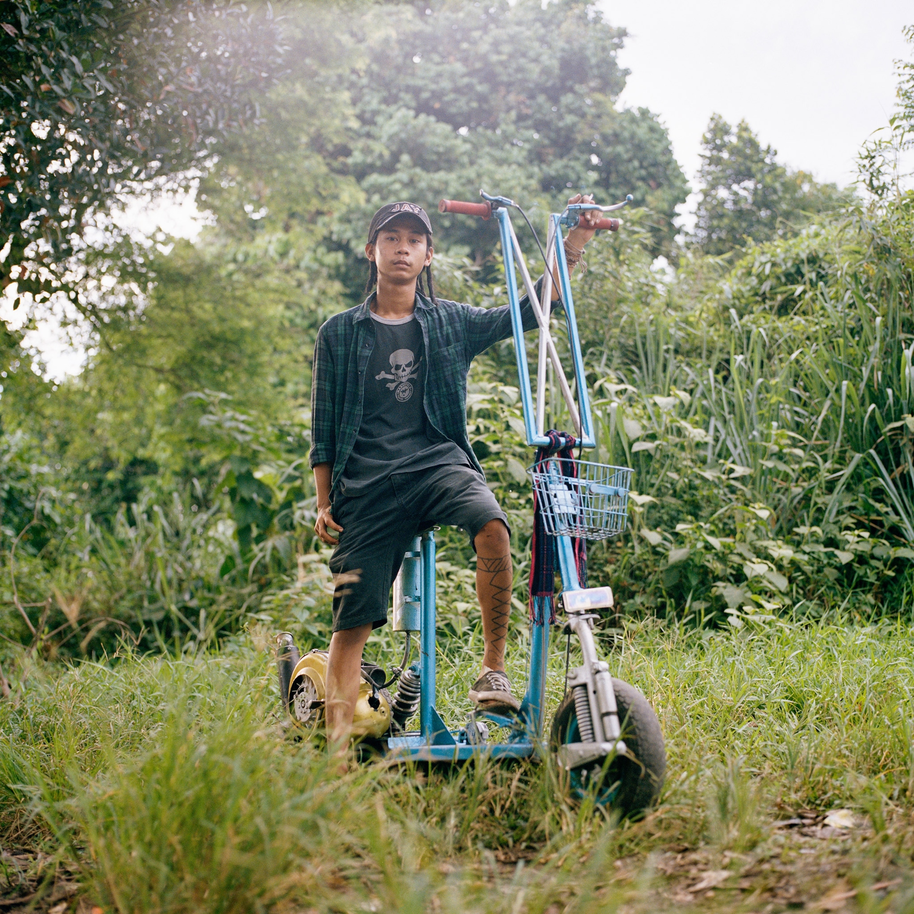 a person on their vespa extreme in Indonesia
