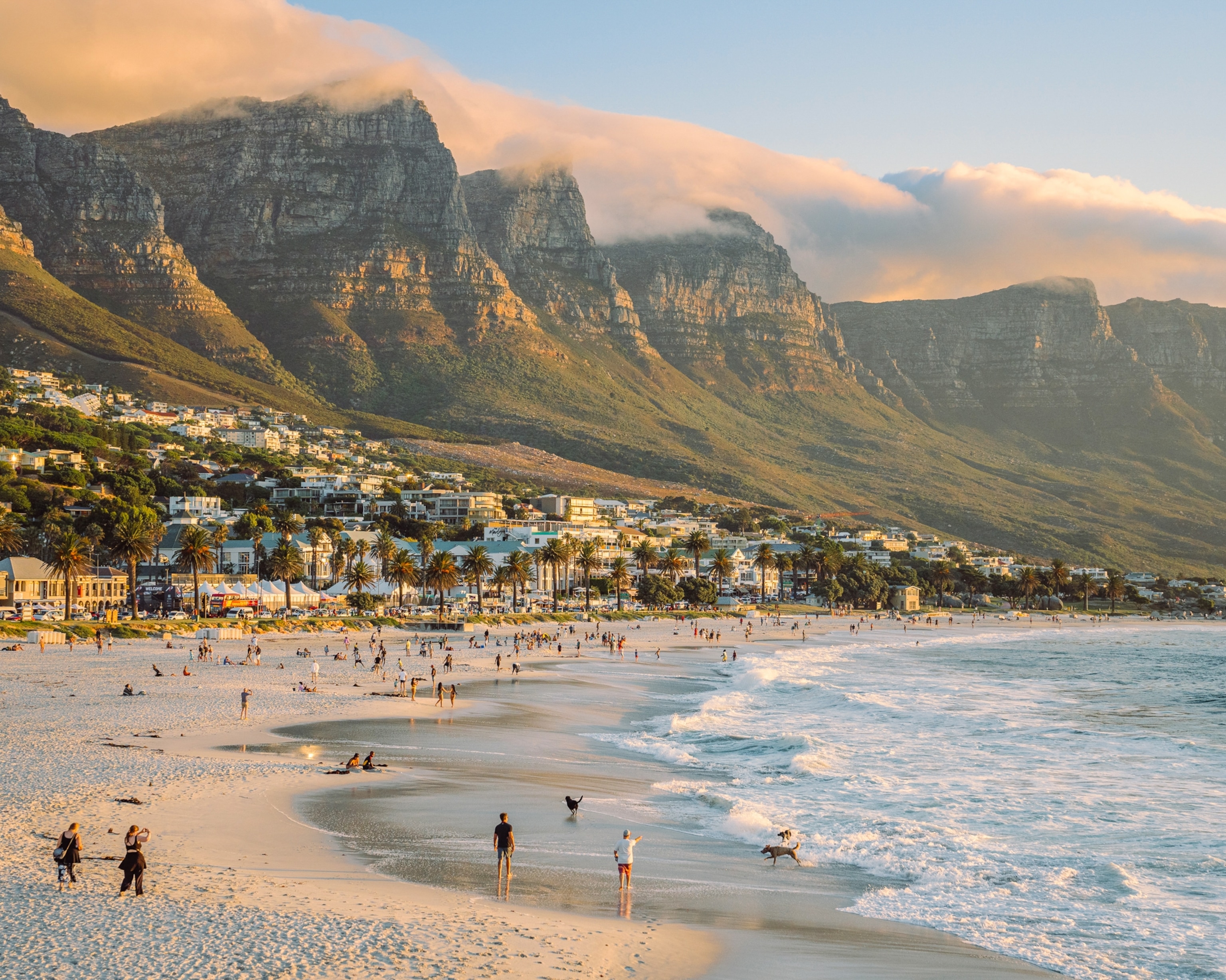 A beach backed by sweeping mountains in Cape Town, South Africa.