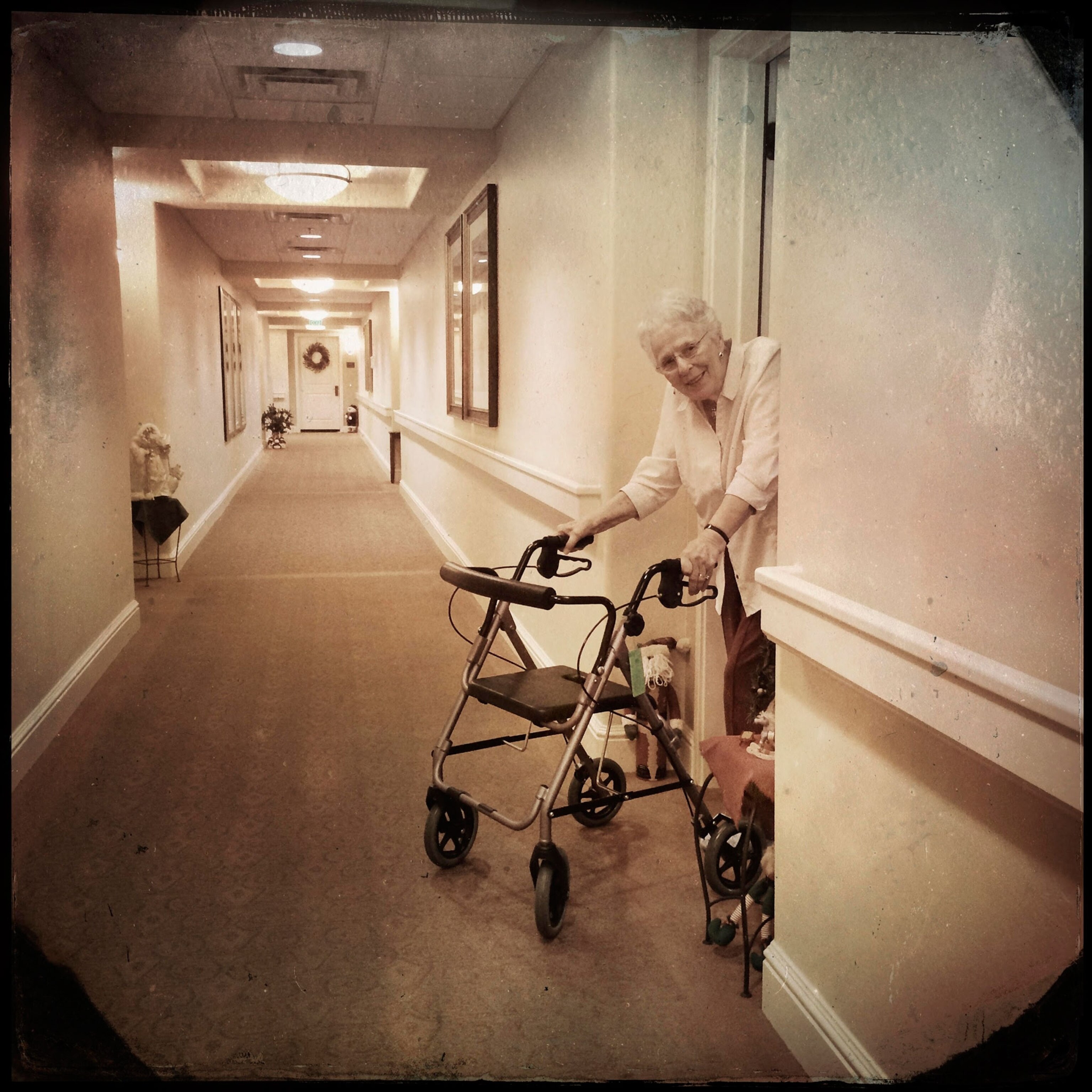 elderly woman using a walker