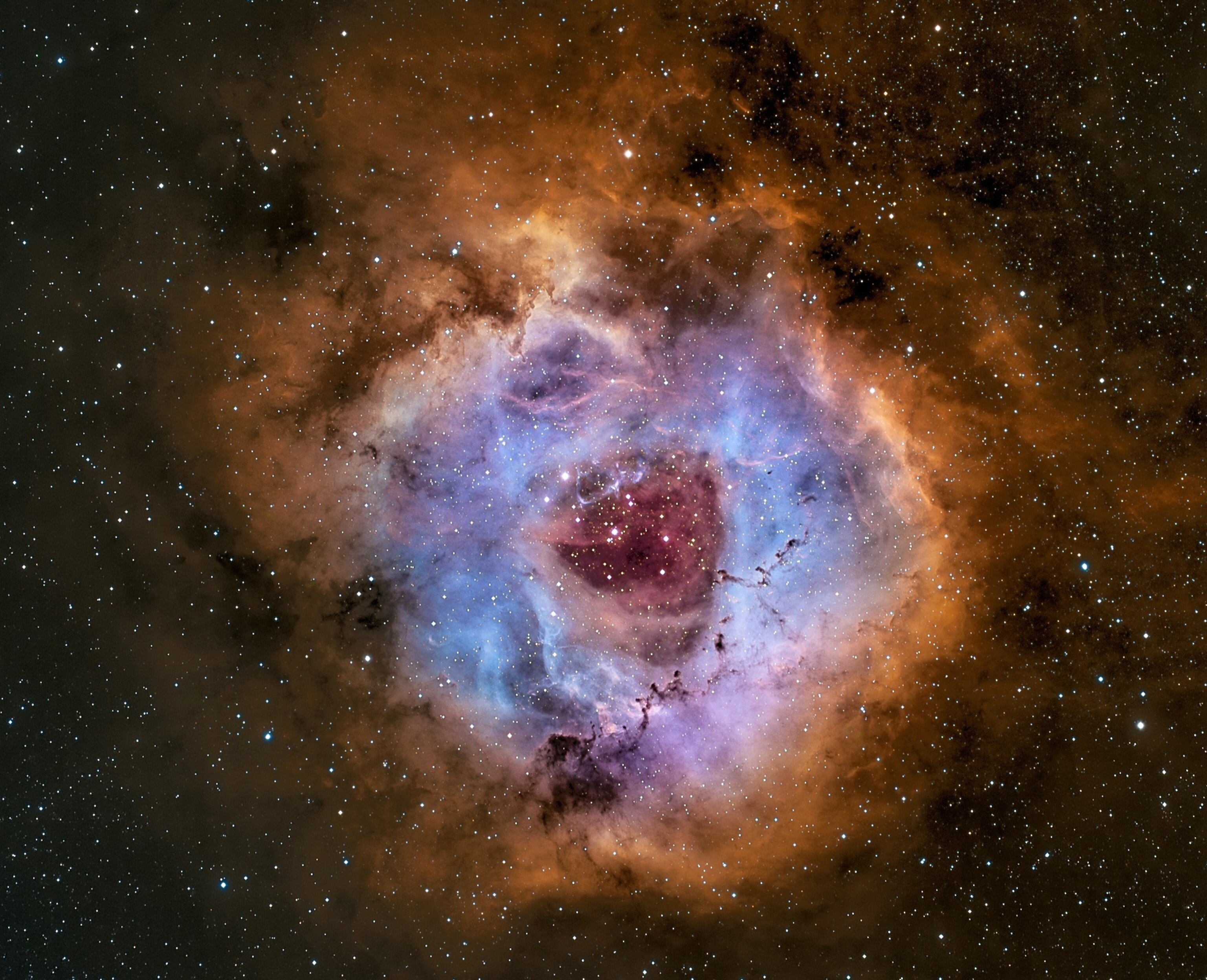 a colorful nebula and star cluster