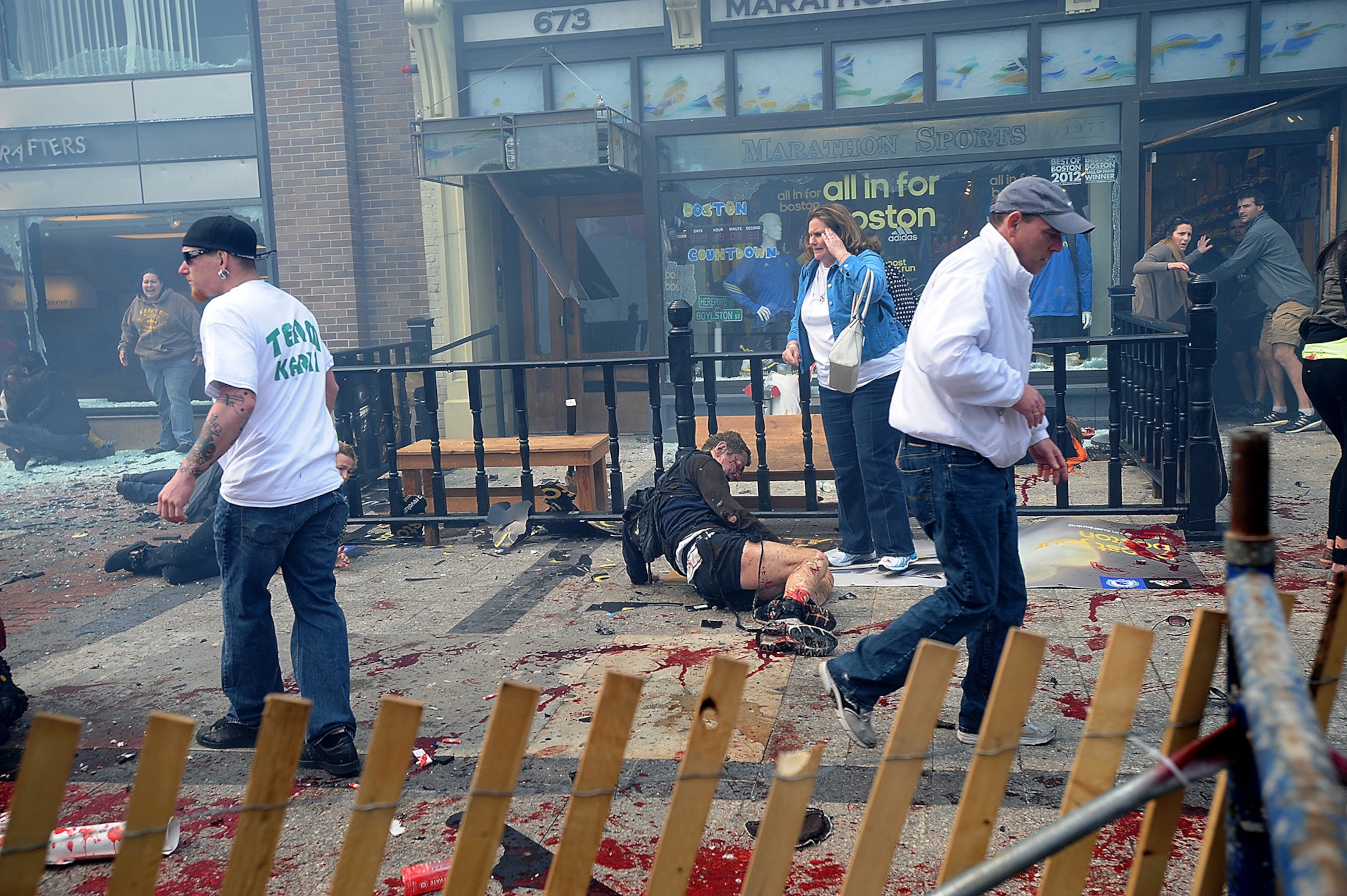 This Week in Boston - Injured people on Boylston Street in Boston at the Marathon finish line.