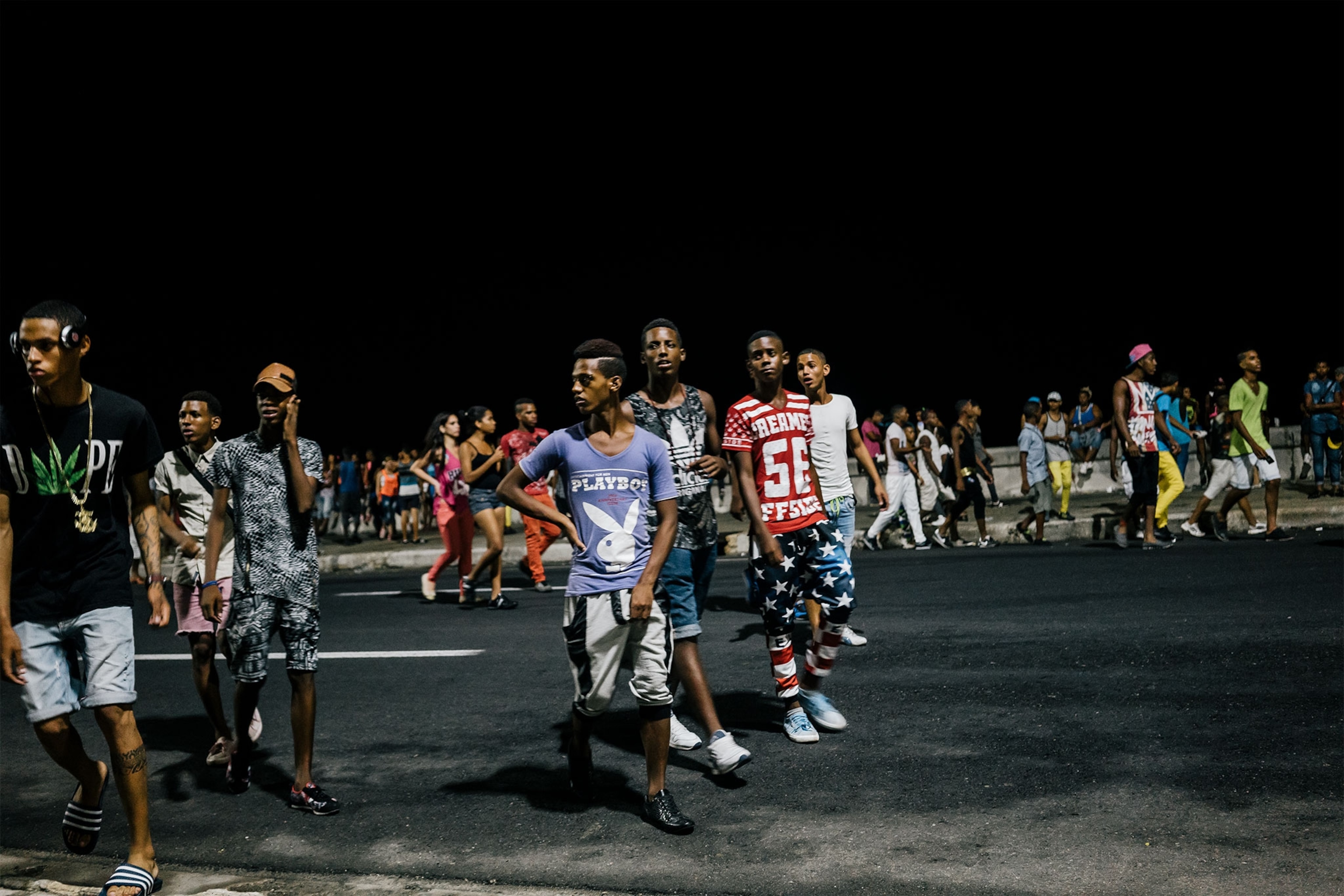 boys walking on the street in Cuba