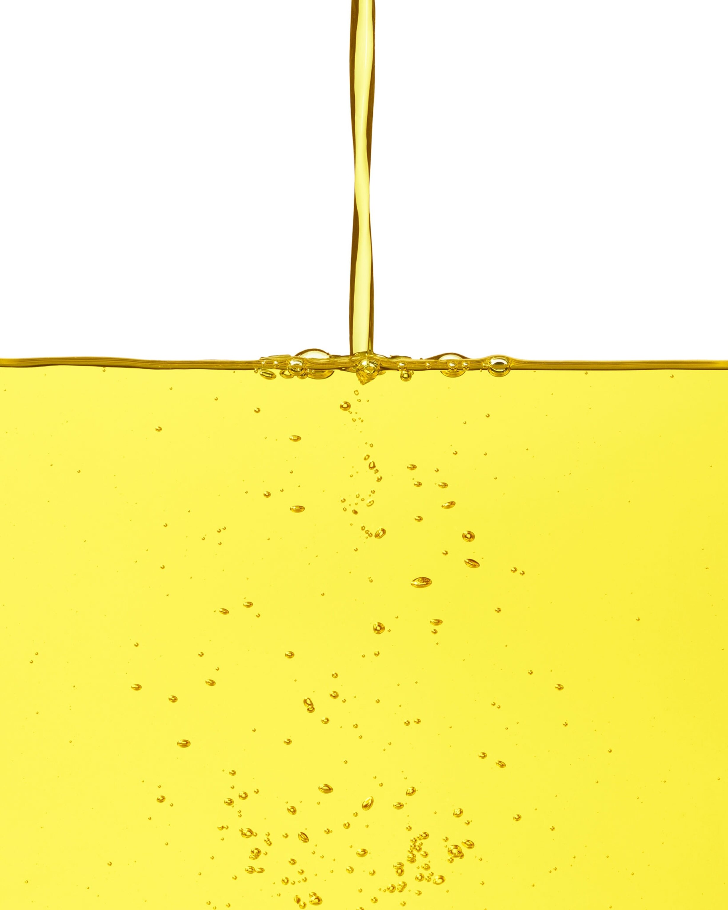 Diacetyl, a bright yellow, liquid food additve that enhances flavor, is being poured out