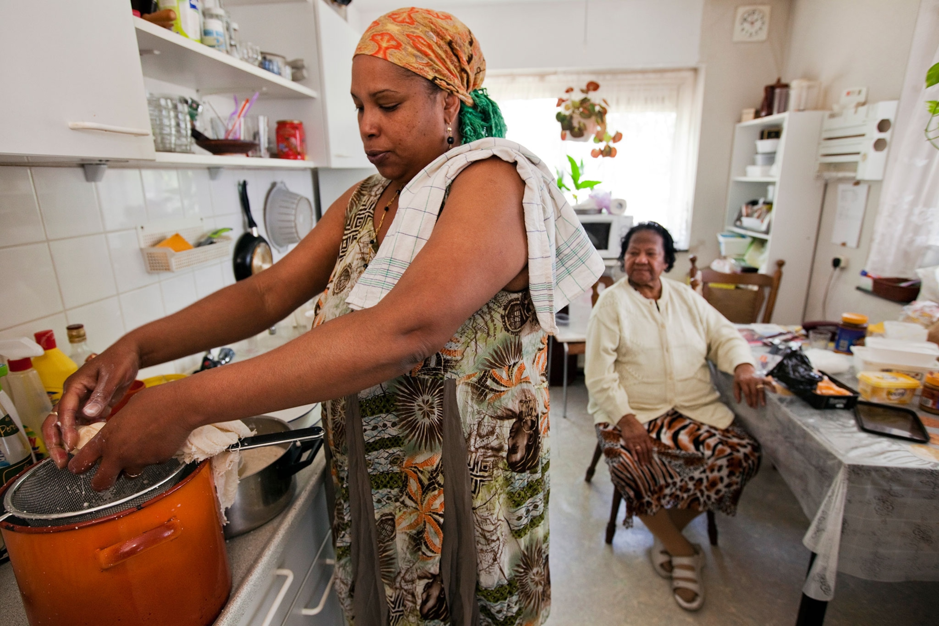 2 women in kitchen