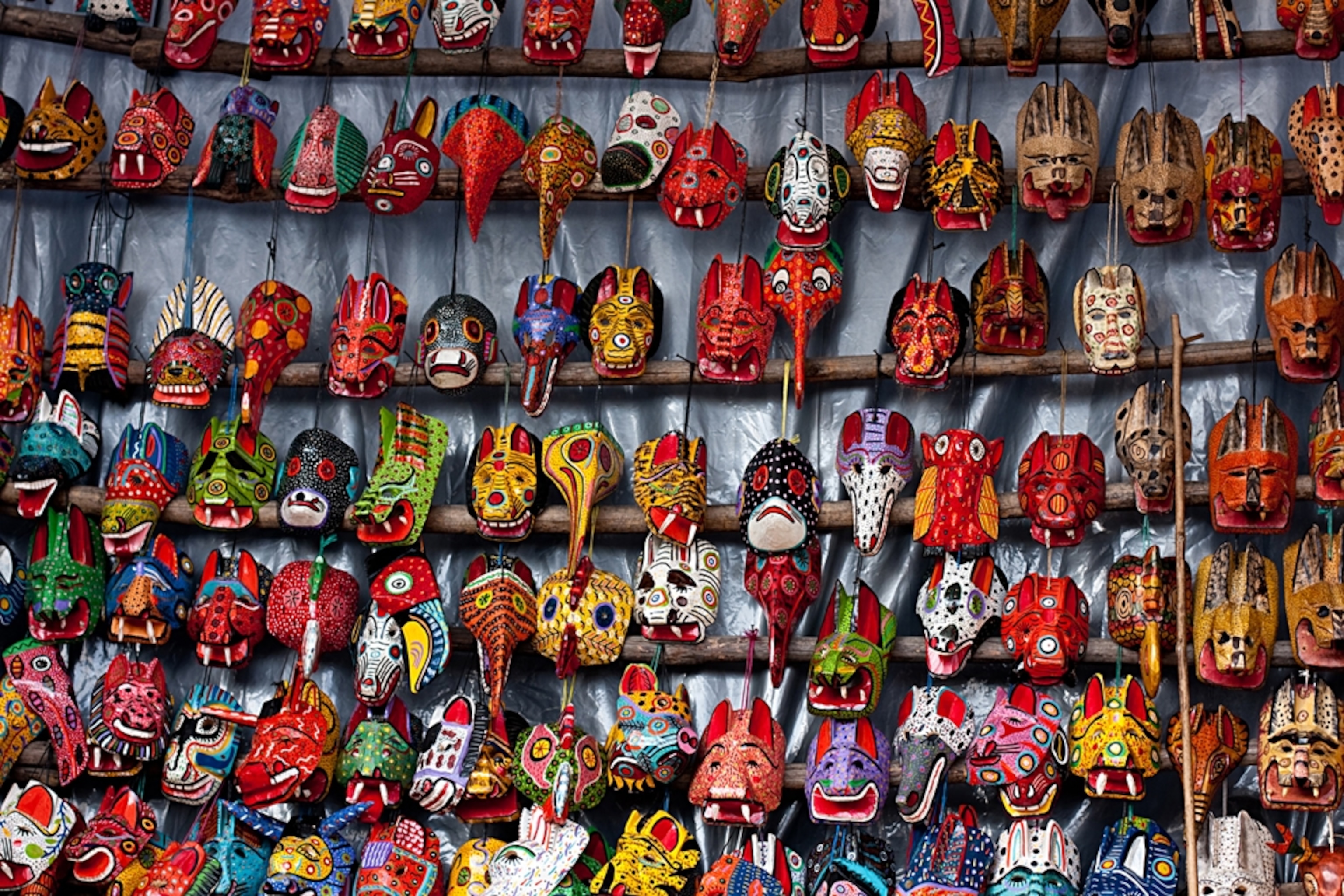masks for sale at a Maya market, Chichicastenango