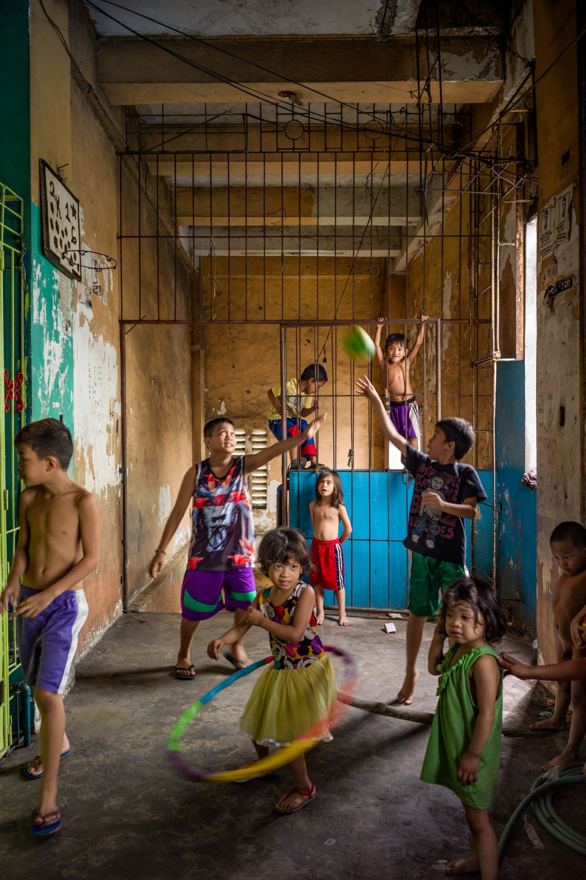 children hula hooping and playing ball