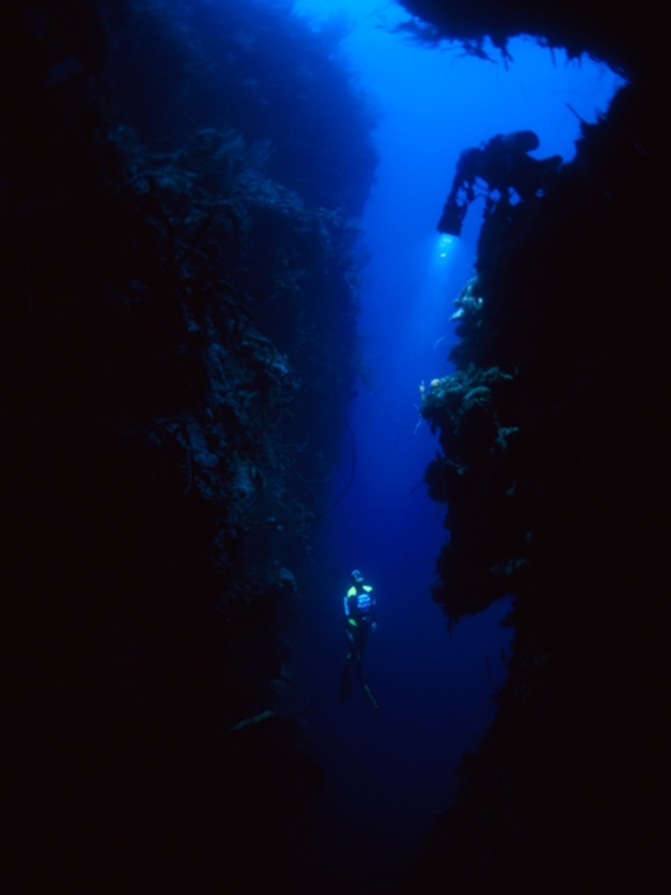 Diver in deep cave