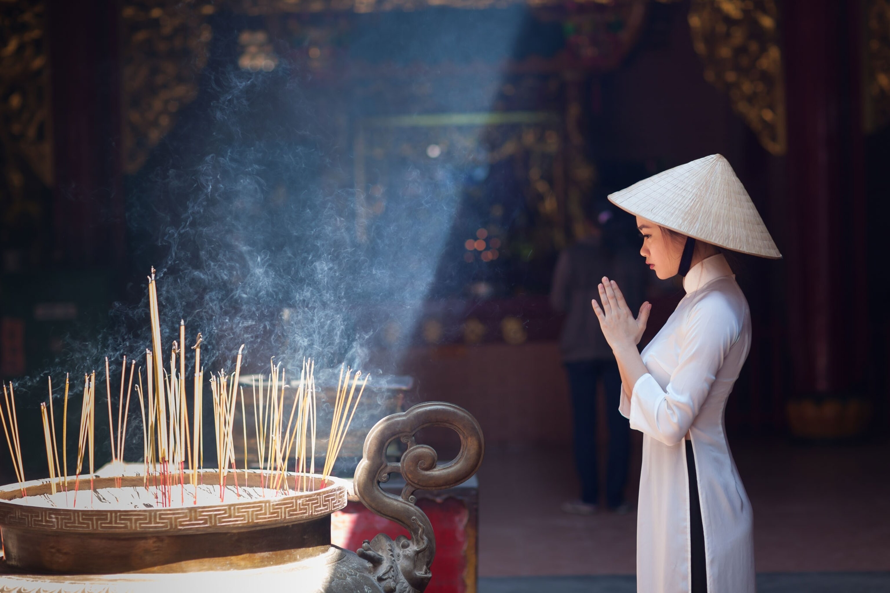 a Girl in a Pagoda, Ho Chi Mihn City, Vietnam