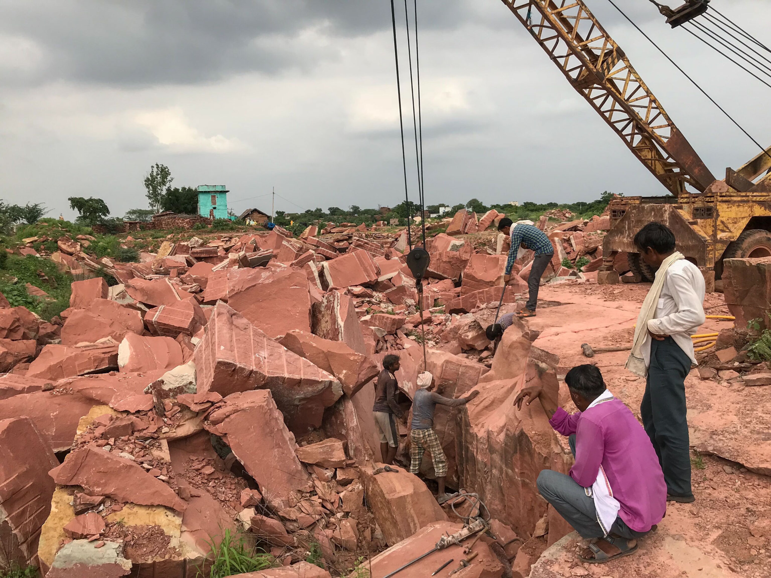 men working in a quarry in India