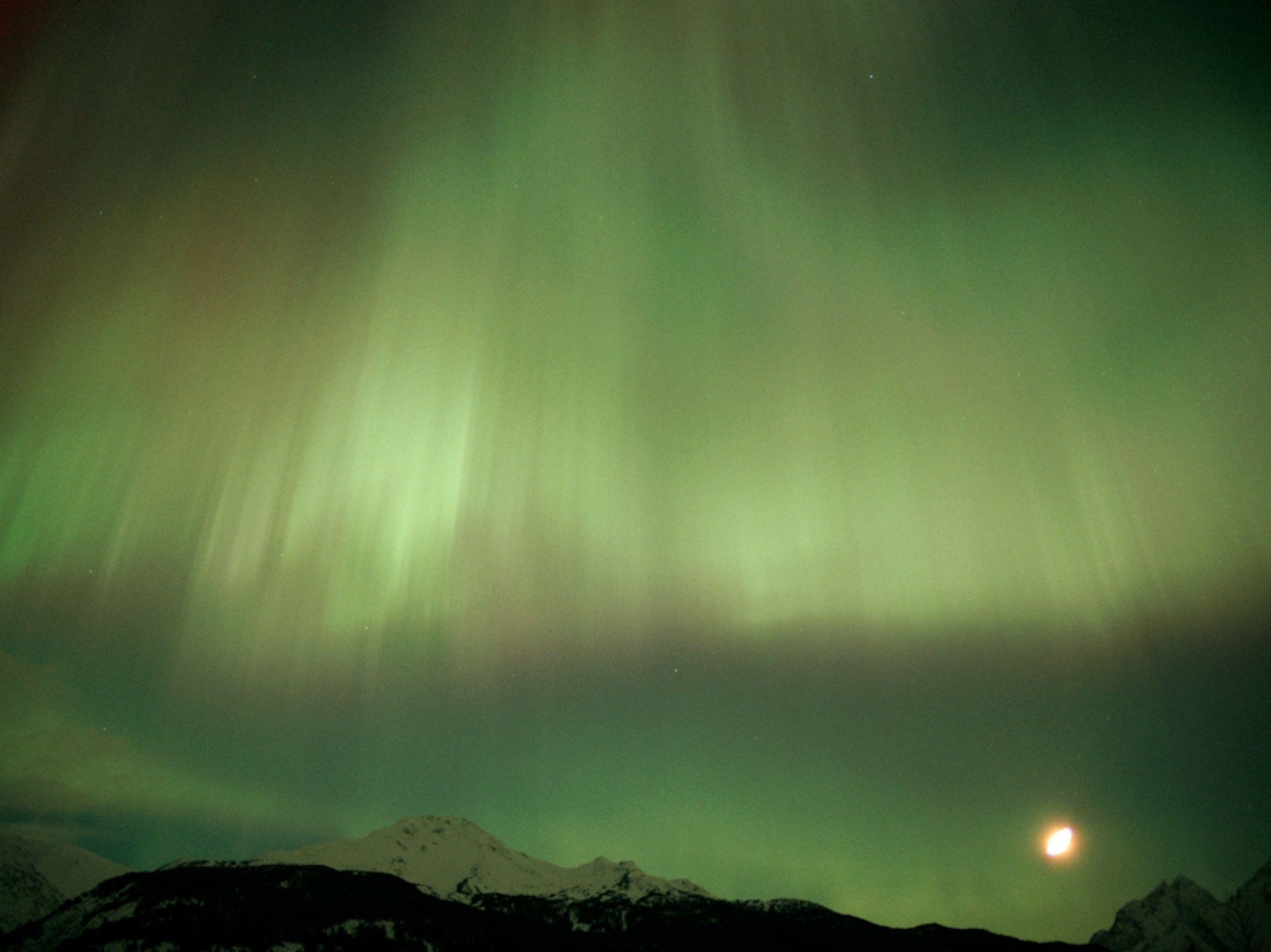 Moon and aurora borealis