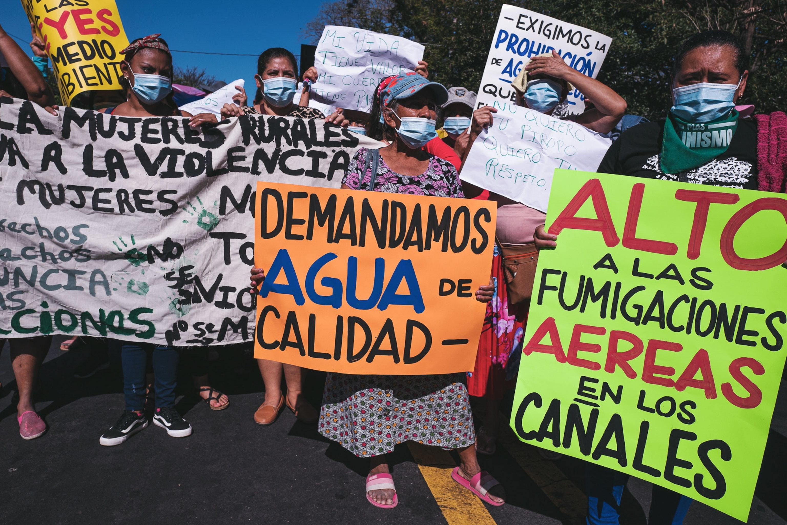 a women's march in El Salvador, where women are protesting to get clean water