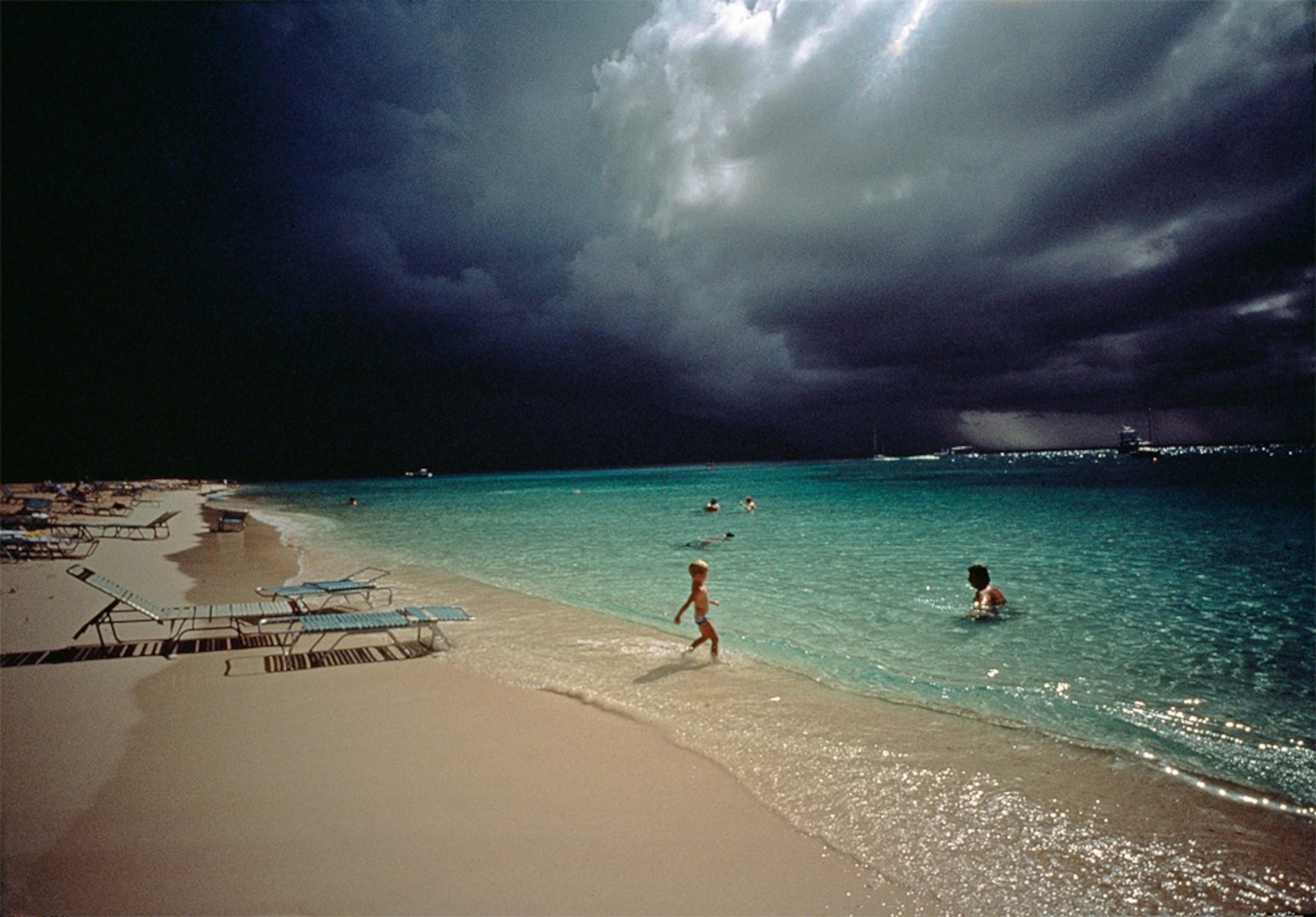 dark storm clouds looming over a beach on Grand Cayman Island