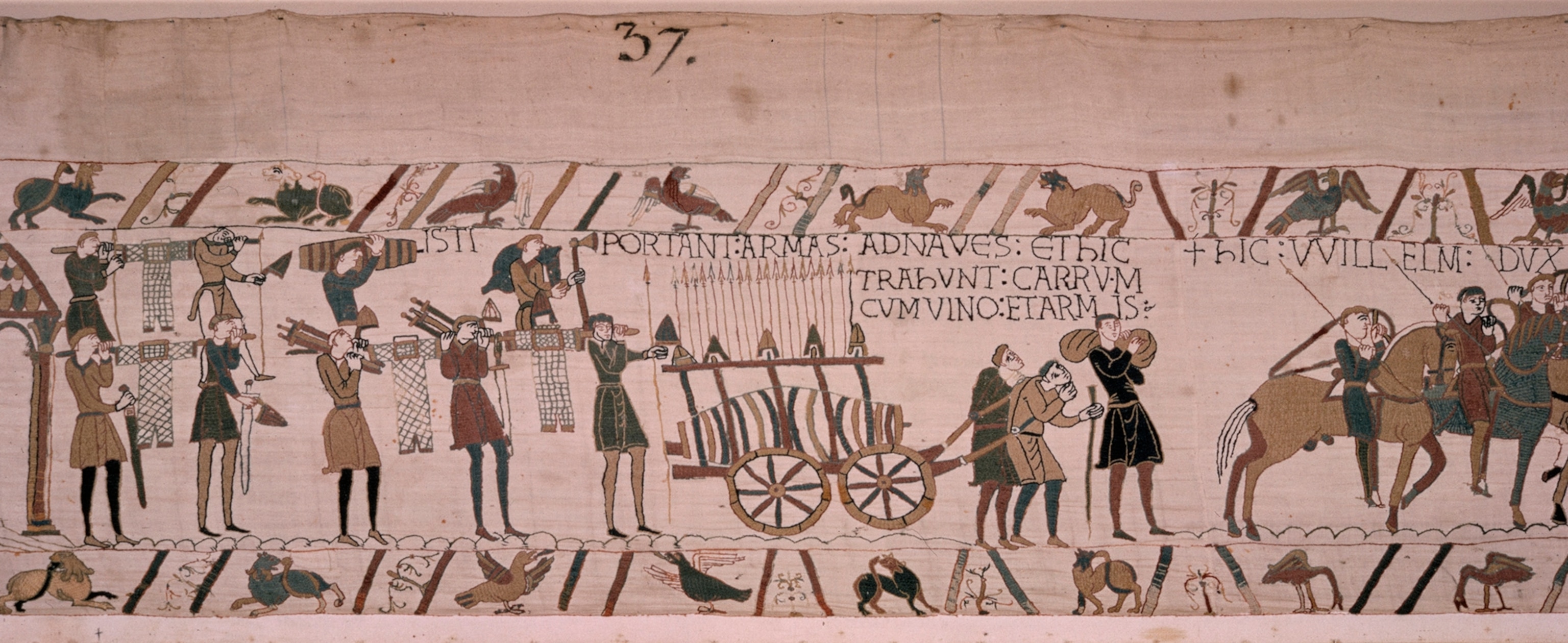 A scene from the tapestry in which the traffic of war clogs the shore.
