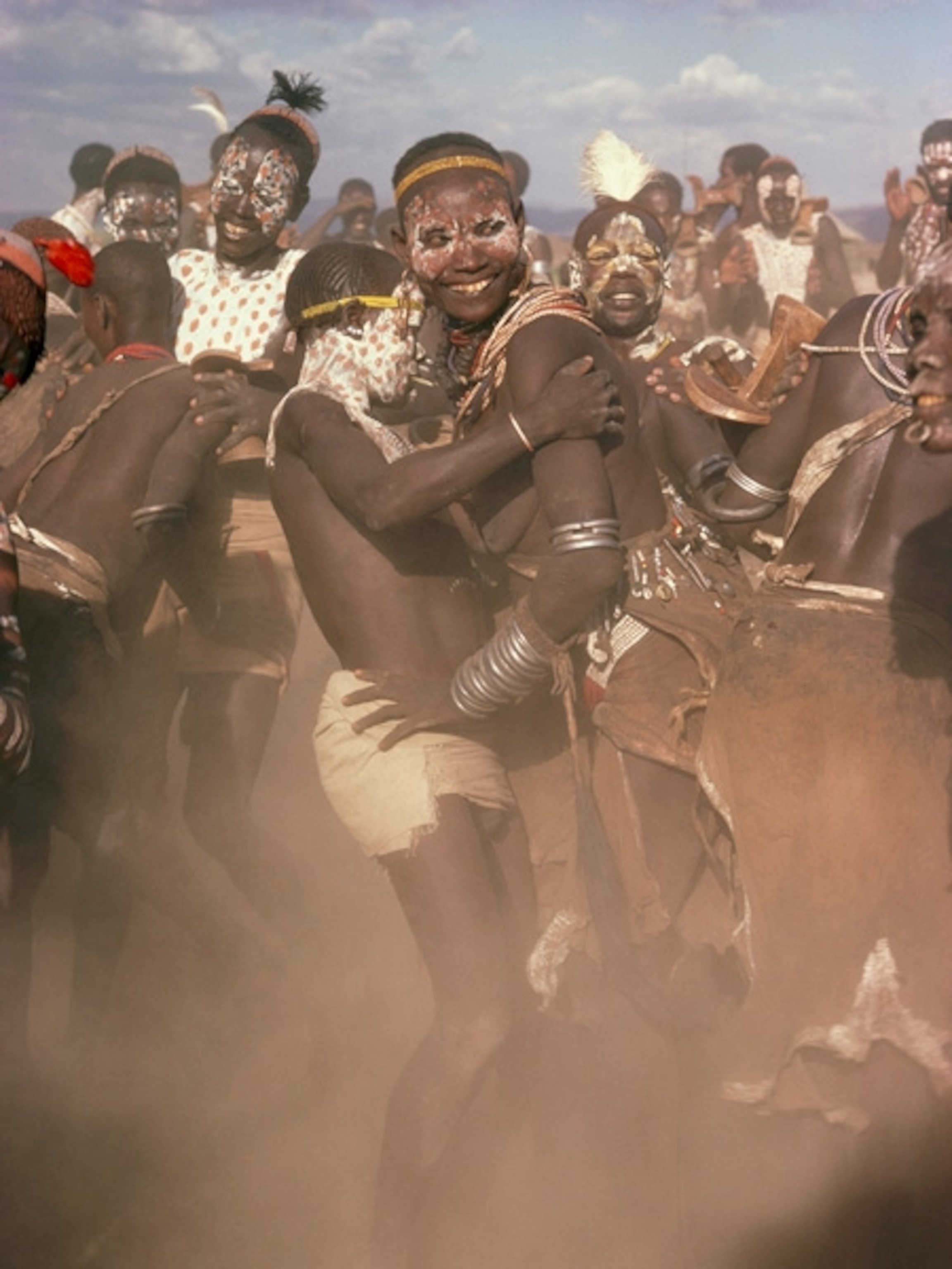 Dust rising up as people dance