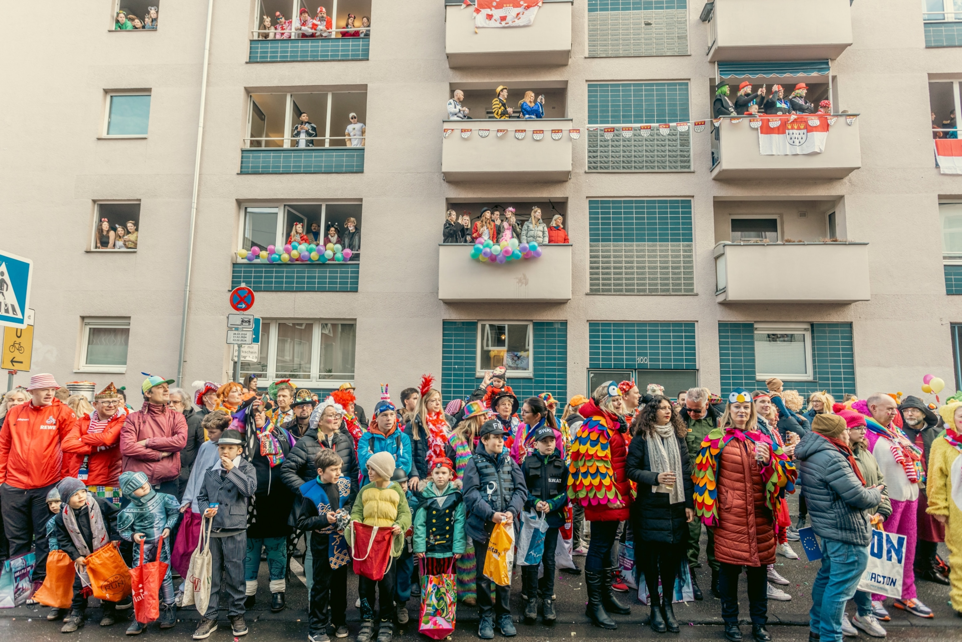 A group of onlookers outside.