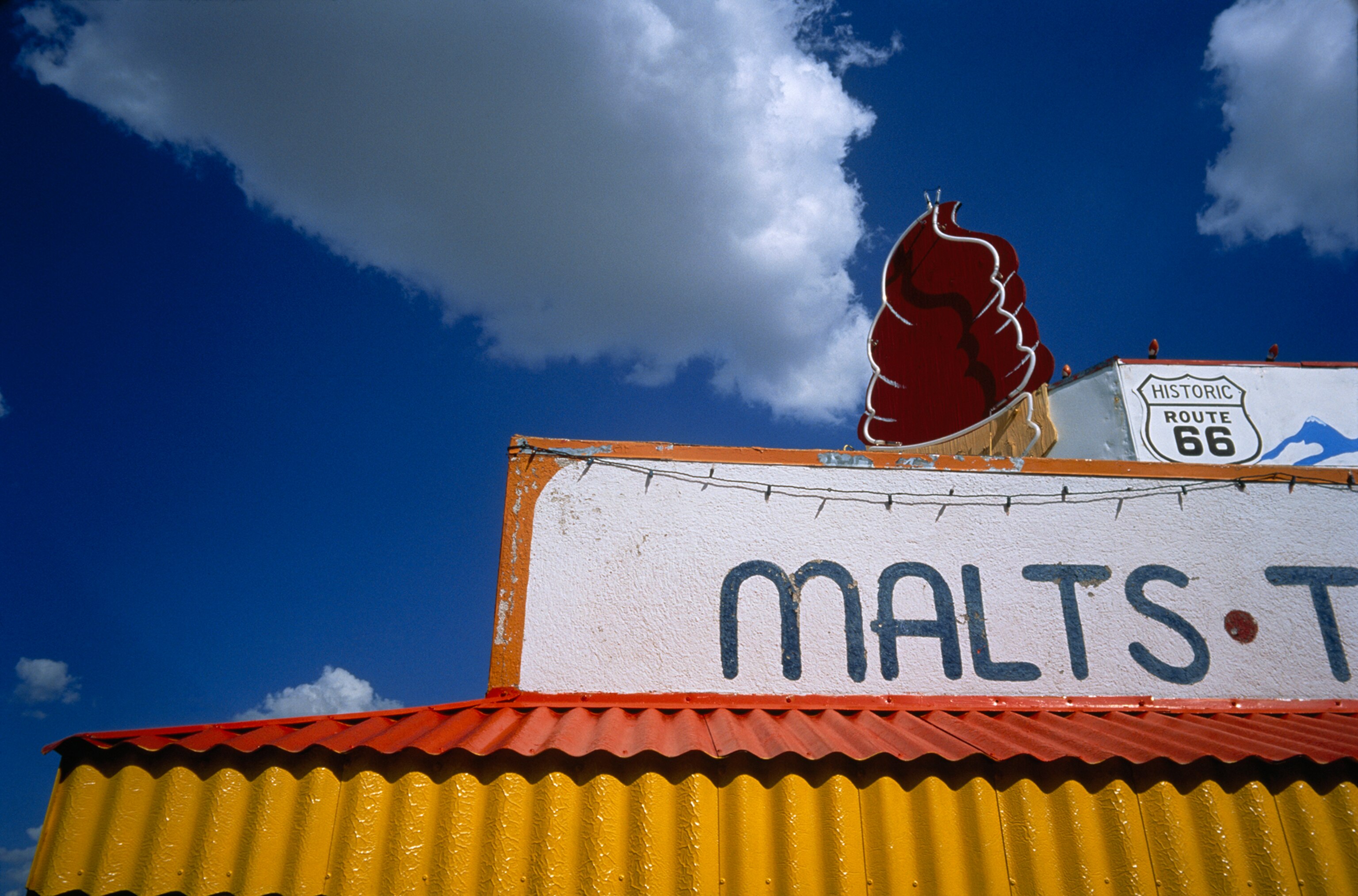 A giant ice cream cones decorate the roof of an ice cream shop near US Route 66 in Arizona.