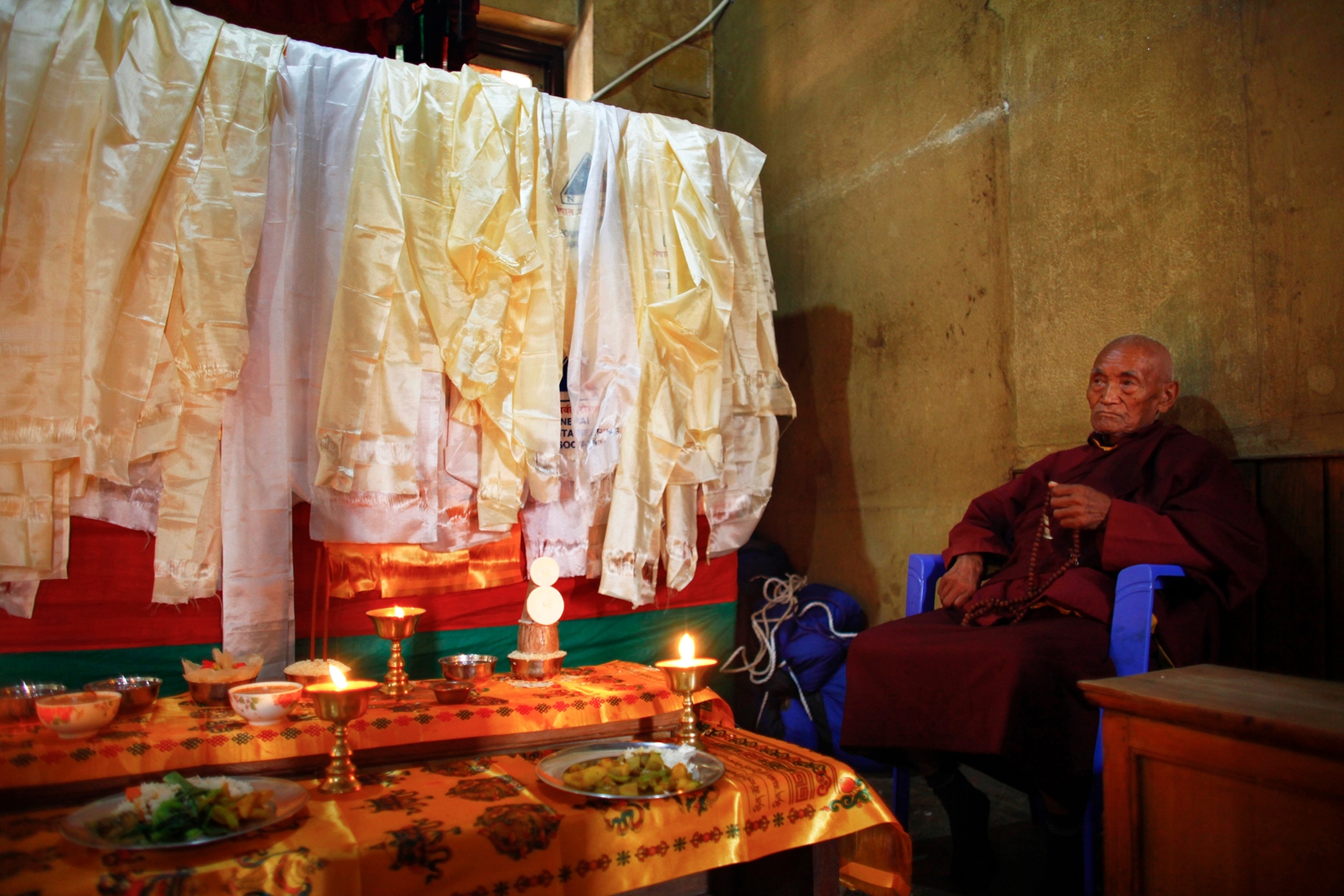 a trekker at the Tenzing Memorial.