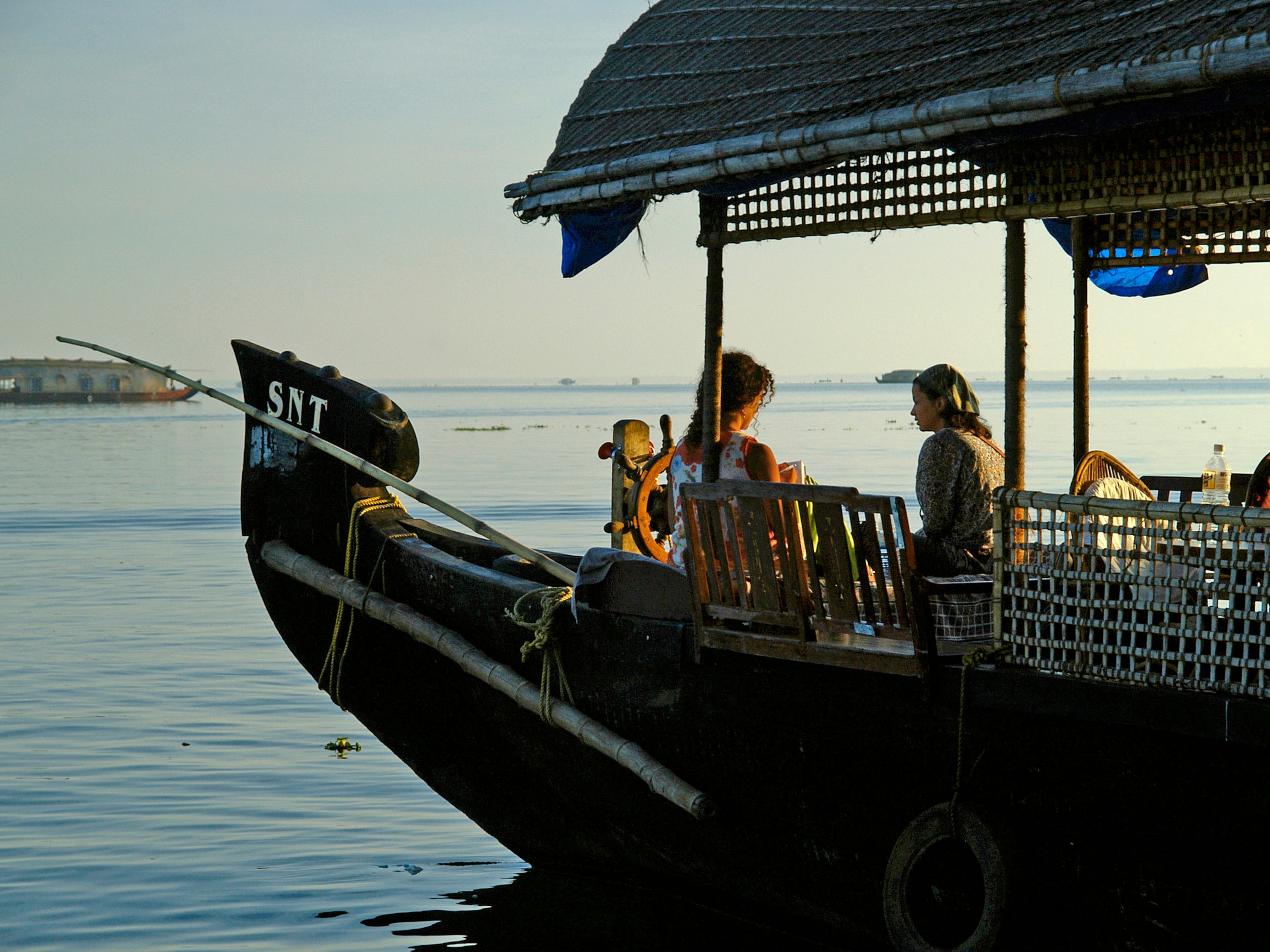 Luxury houseboats leisurely cruise Kerala backwaters