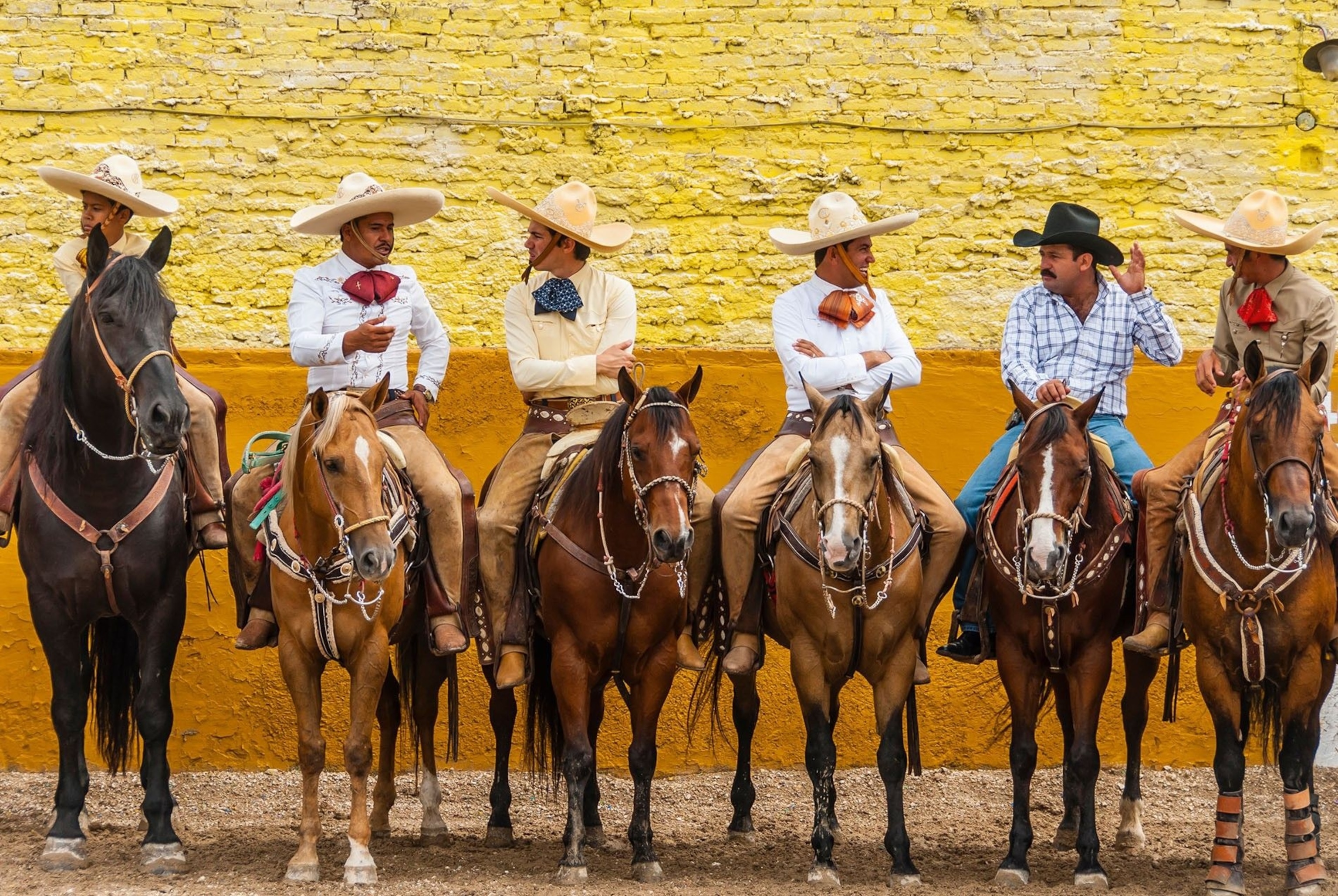 Men on horses ready for Guadalajara's Charreada Parade in Jalisco