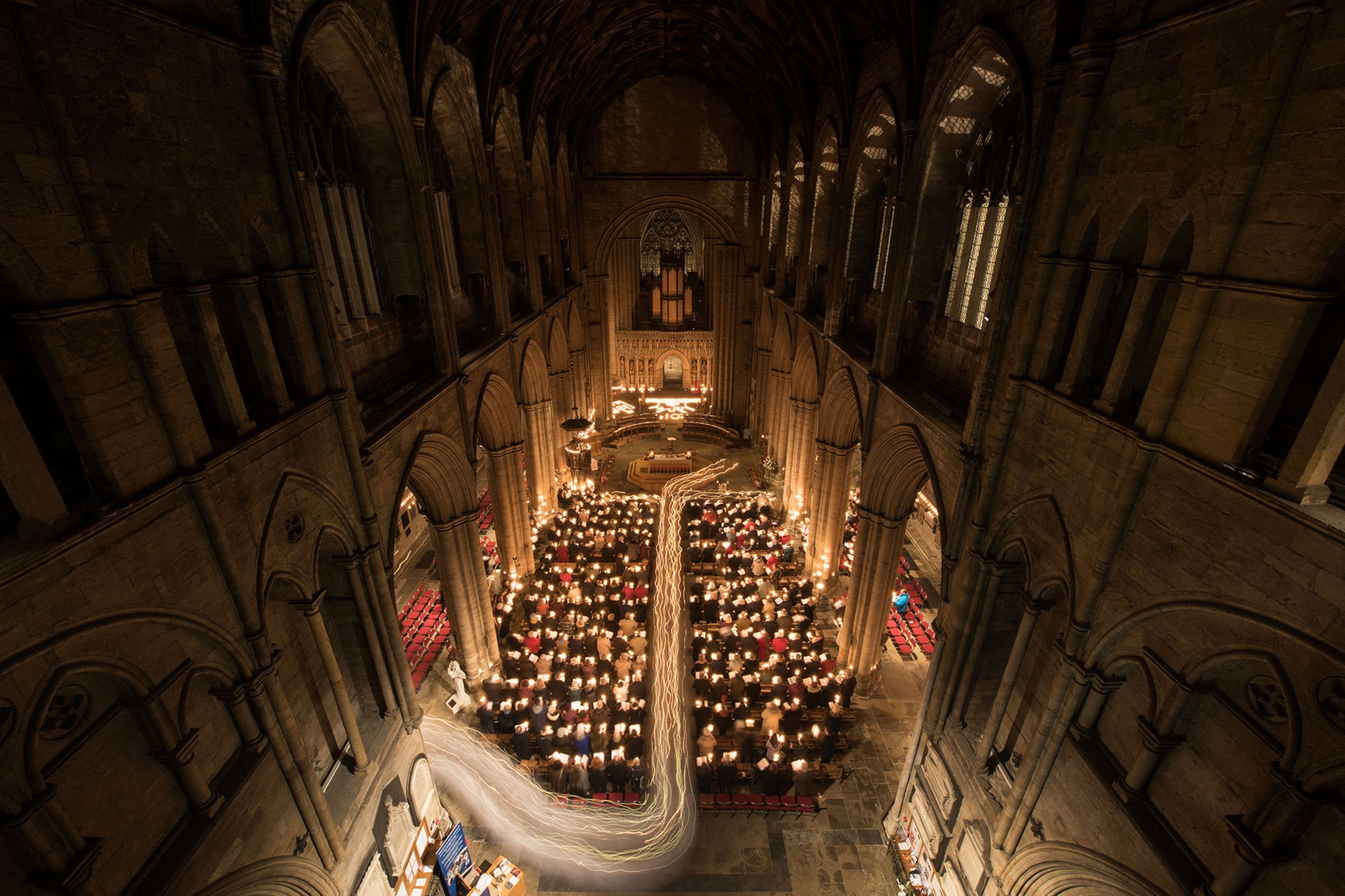Members of the congregation take part in a candlelit procession as they attend the Candlemas Festal Eucharist service at Ripon Cathedral in Ripon, northern England.