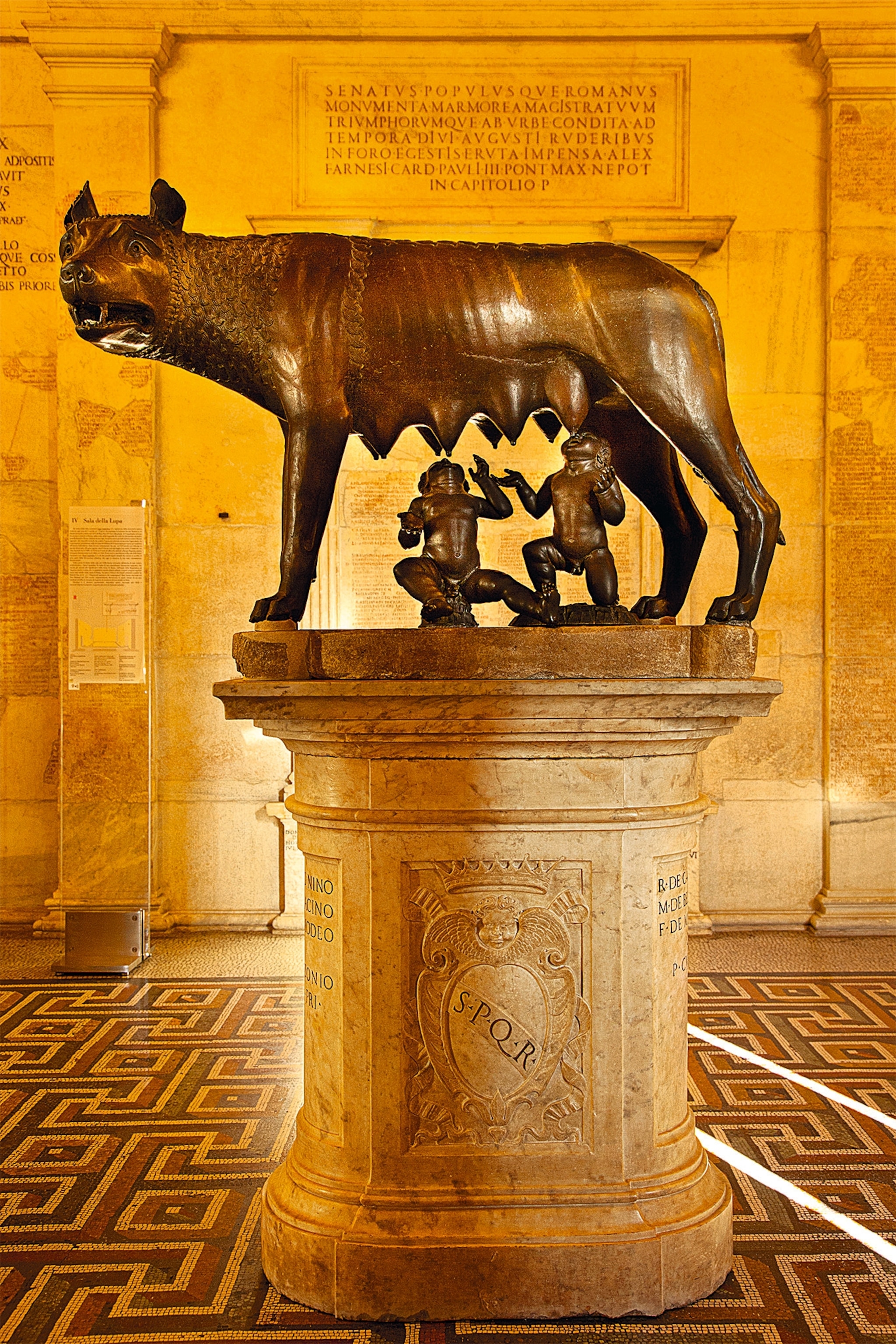 A hollow-cast bronze she-wolf is pictured.