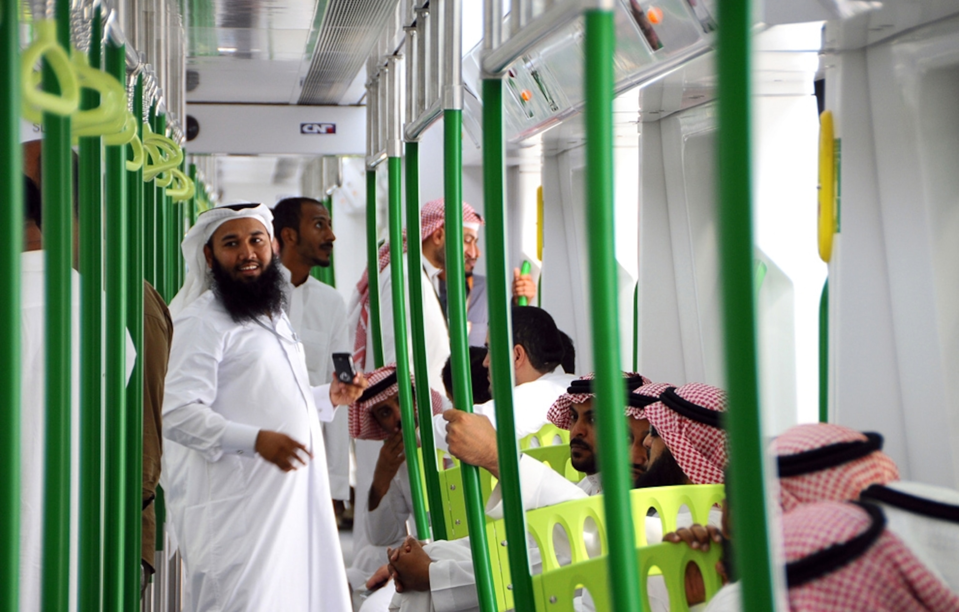 The new Mecca Metro, or Mashair Railway, is ridden by men in Saudi Arabia (picture)