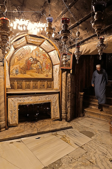 The Church of the Nativity in Bethlehem is believed to house the site where Mary gave birth to Jesus. Tradition holds that the silver star in the niche marks the exact location.