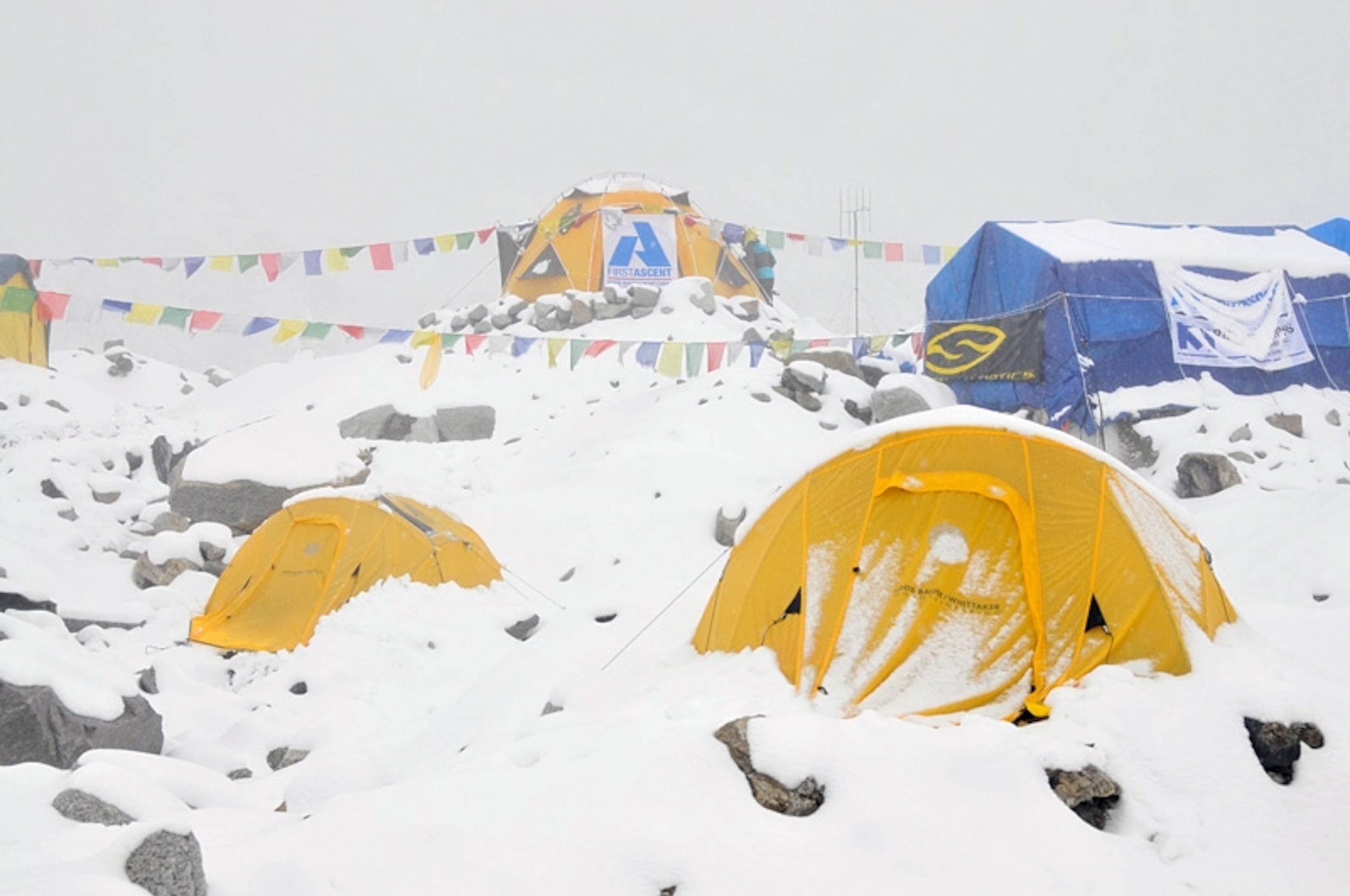 Snow piles up on the First Ascent basecamp