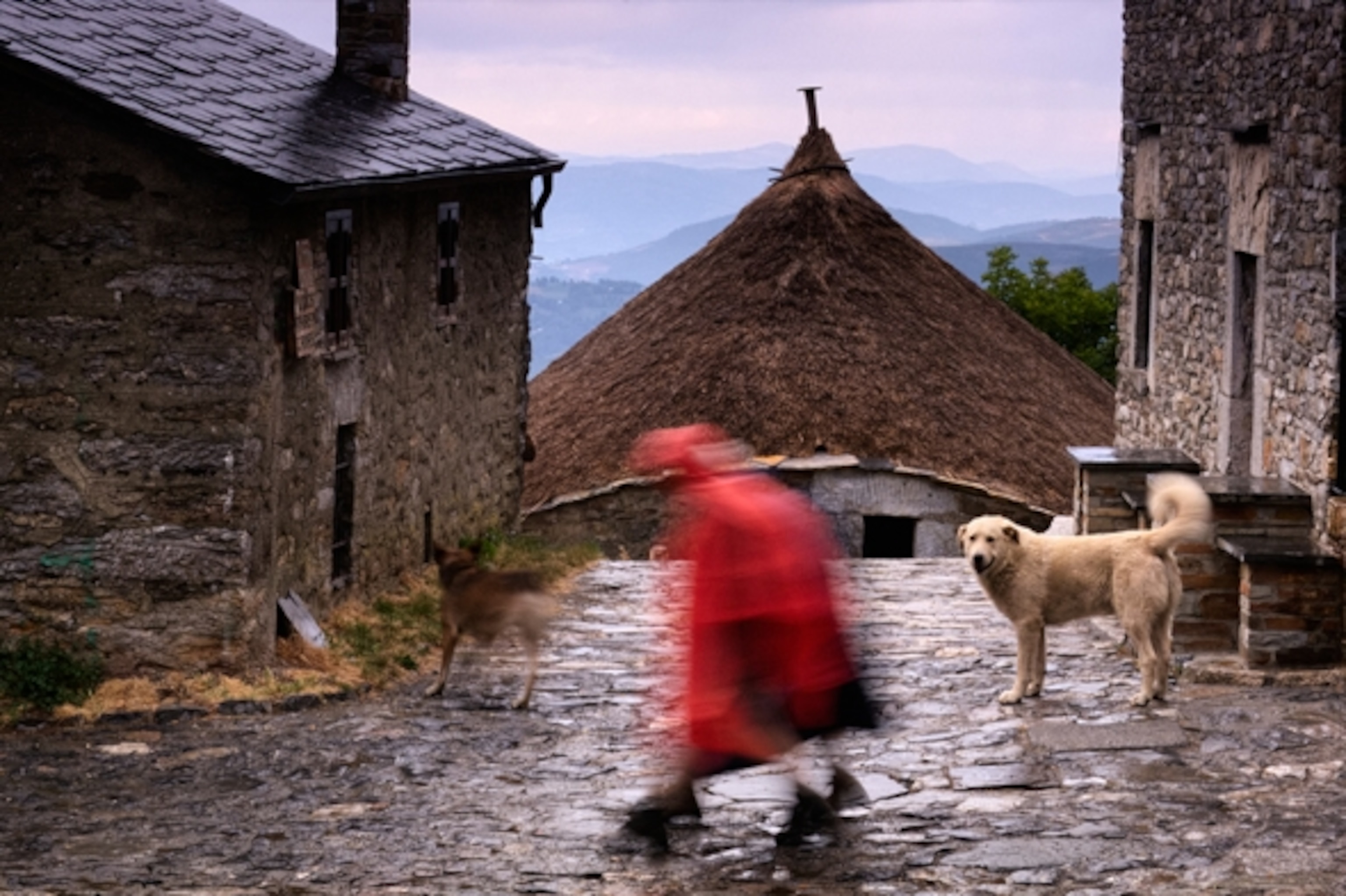 Morning view of O Cebreiro as pilgrims head out on a rainy day (Photograph by Jim Richardson)