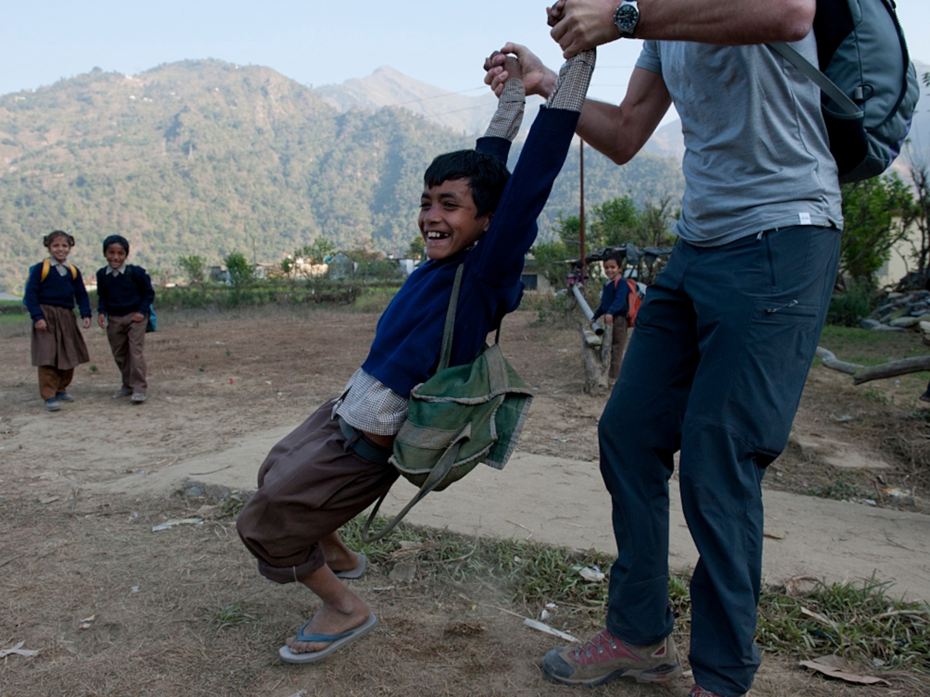 Dutch guest plays with school children