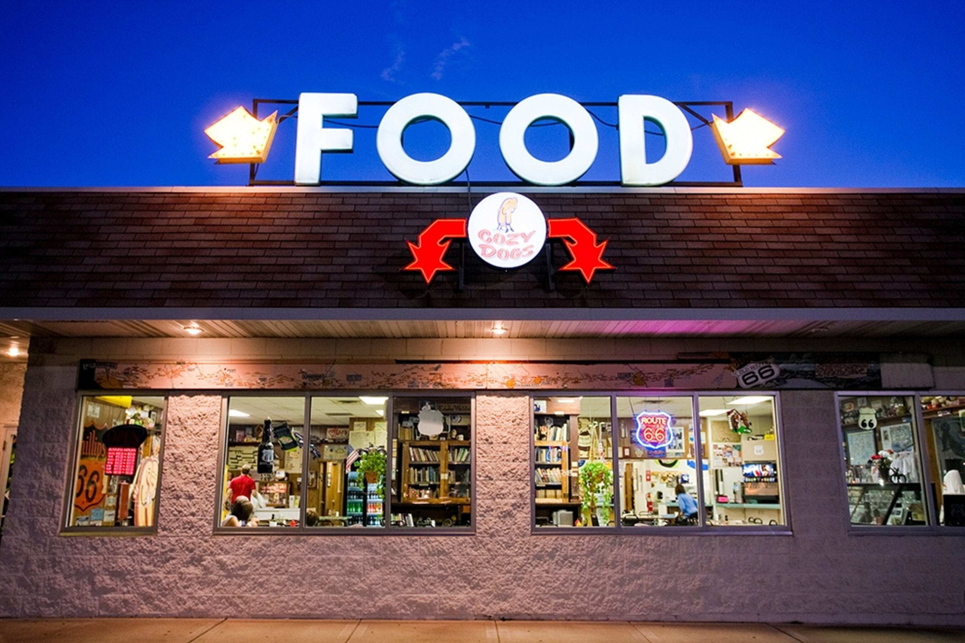 a neon sign in front of Cozy Dog Drive In, Illinois