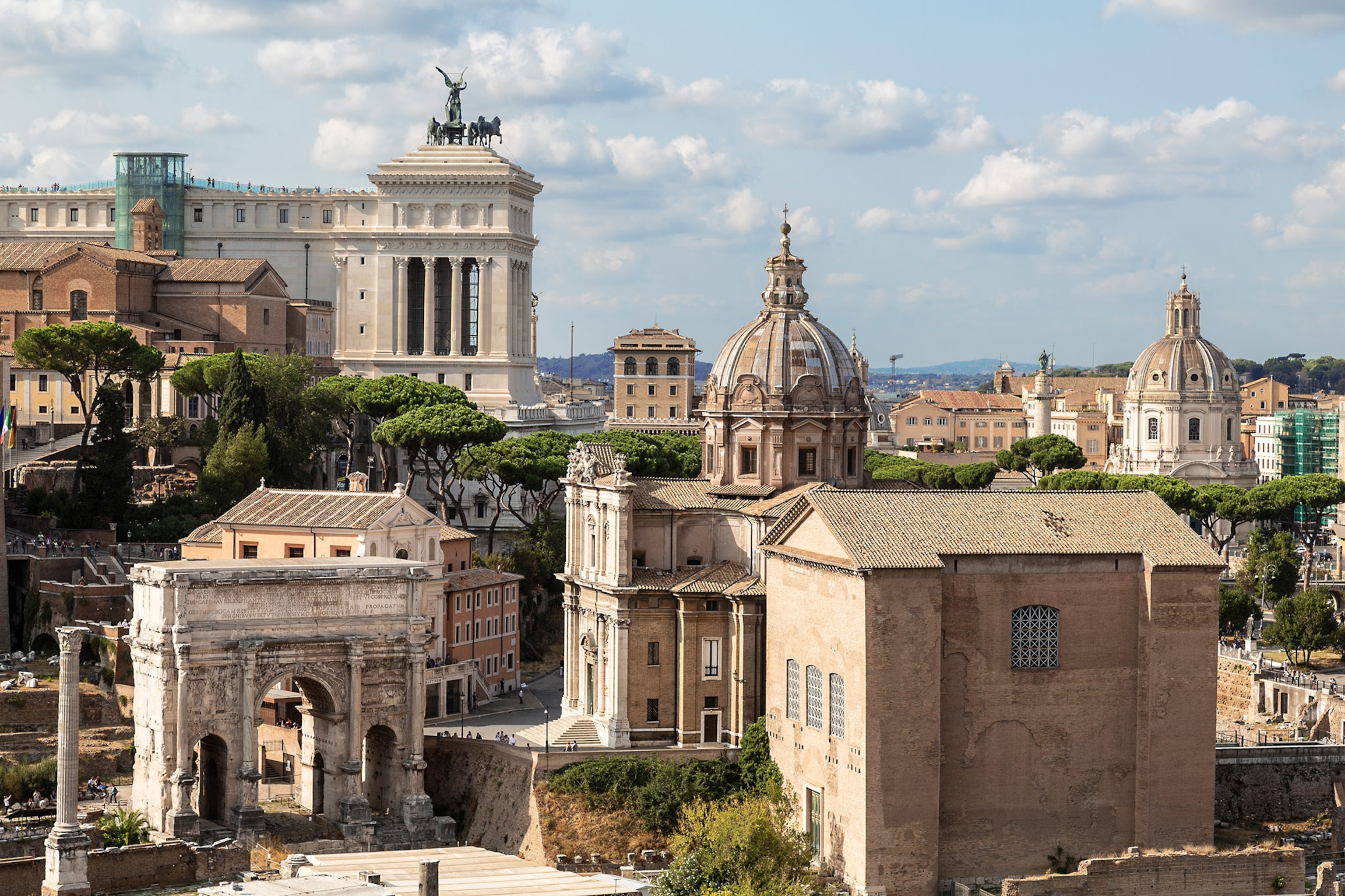 View of the Roman Forum with monuments of architecture and history of ancient Rome.
