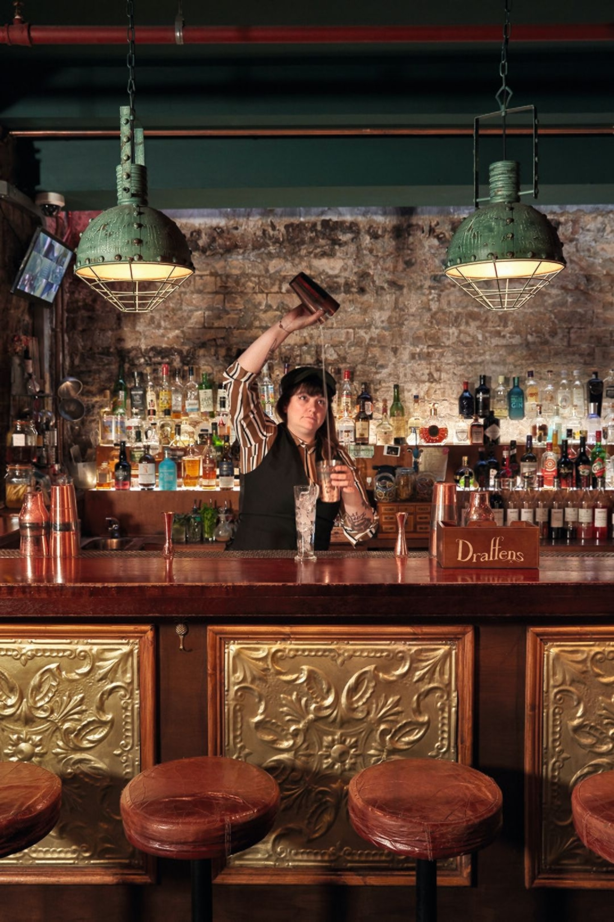 Mixing a gin cocktail at Draffens bar.