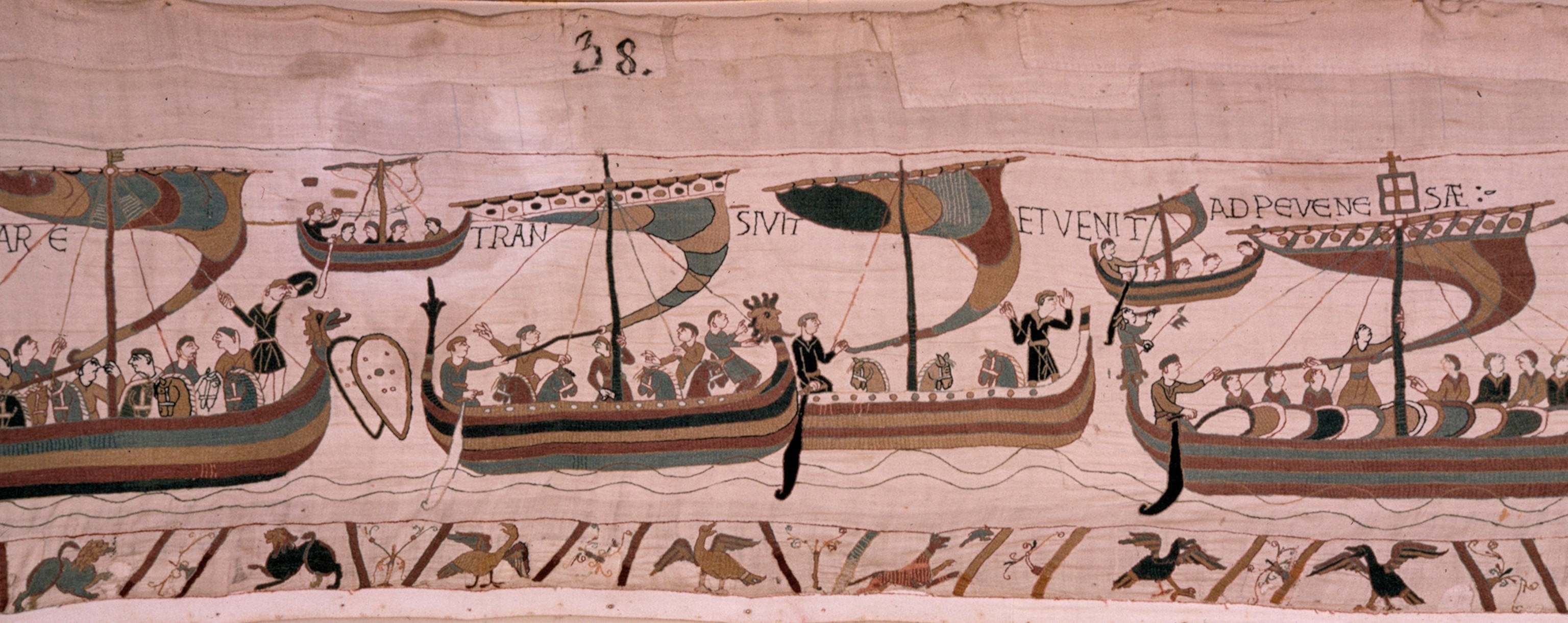 A scene from the tapestry in which the Norman invaders' ships sail.