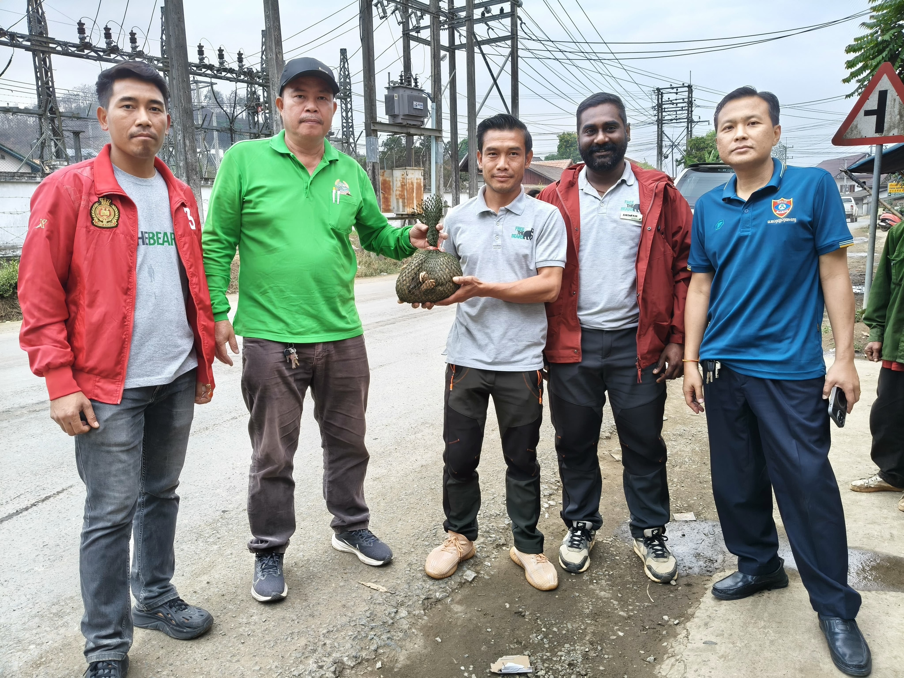 Members of a Free the Bears team that helped save a Pangolin.