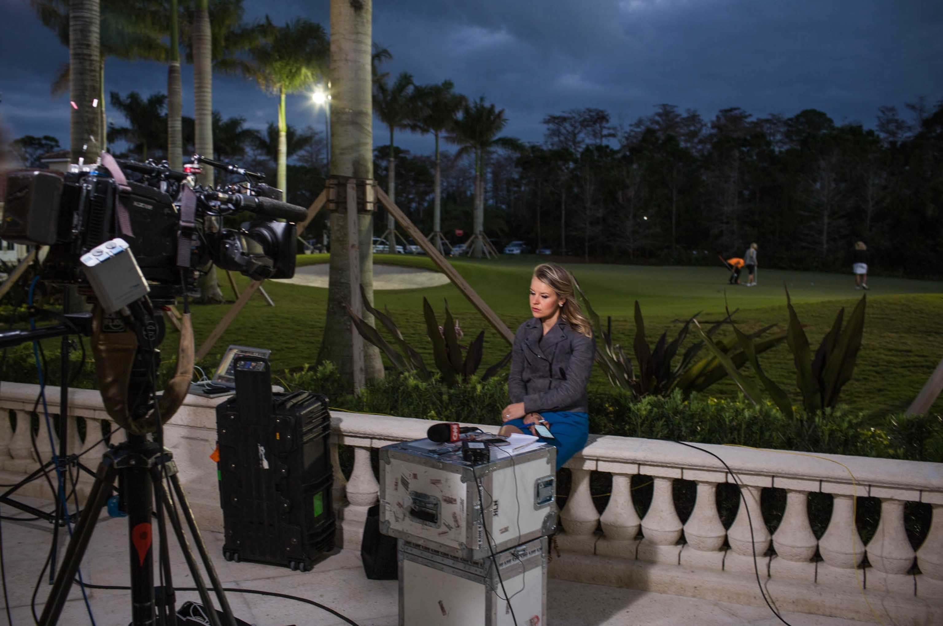 television journalist waiting for broadcast