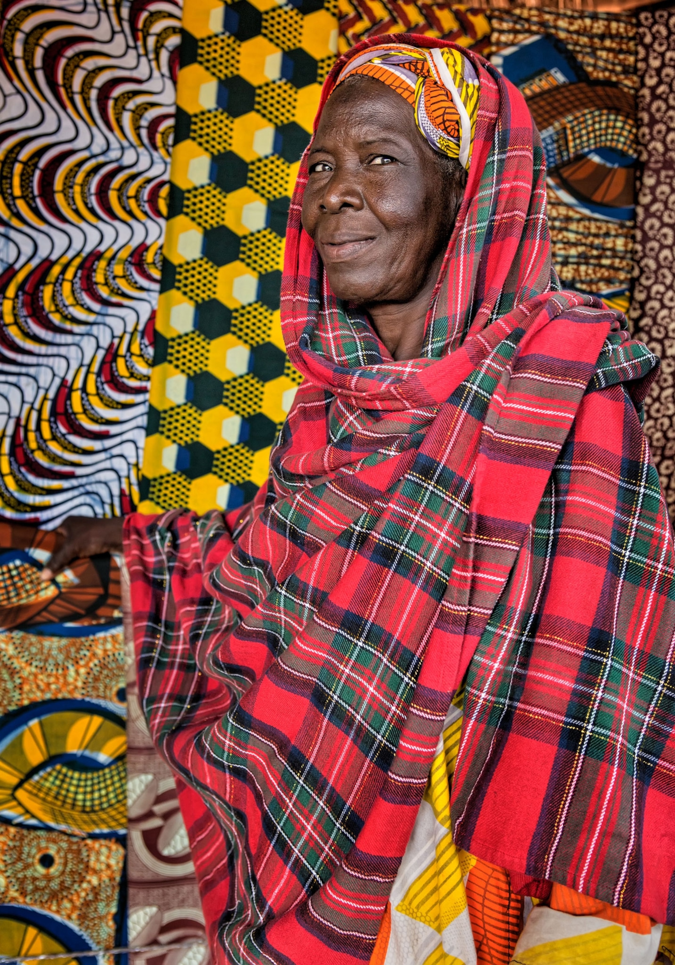 a woman at an outdoor market in Burkina Faso