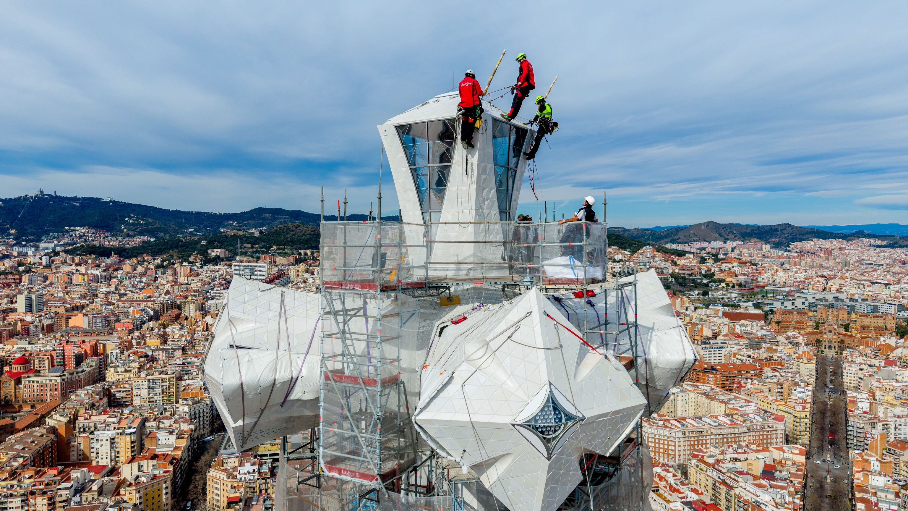 two two groups of six people each work regularly as climbers in Sagrada Familia.