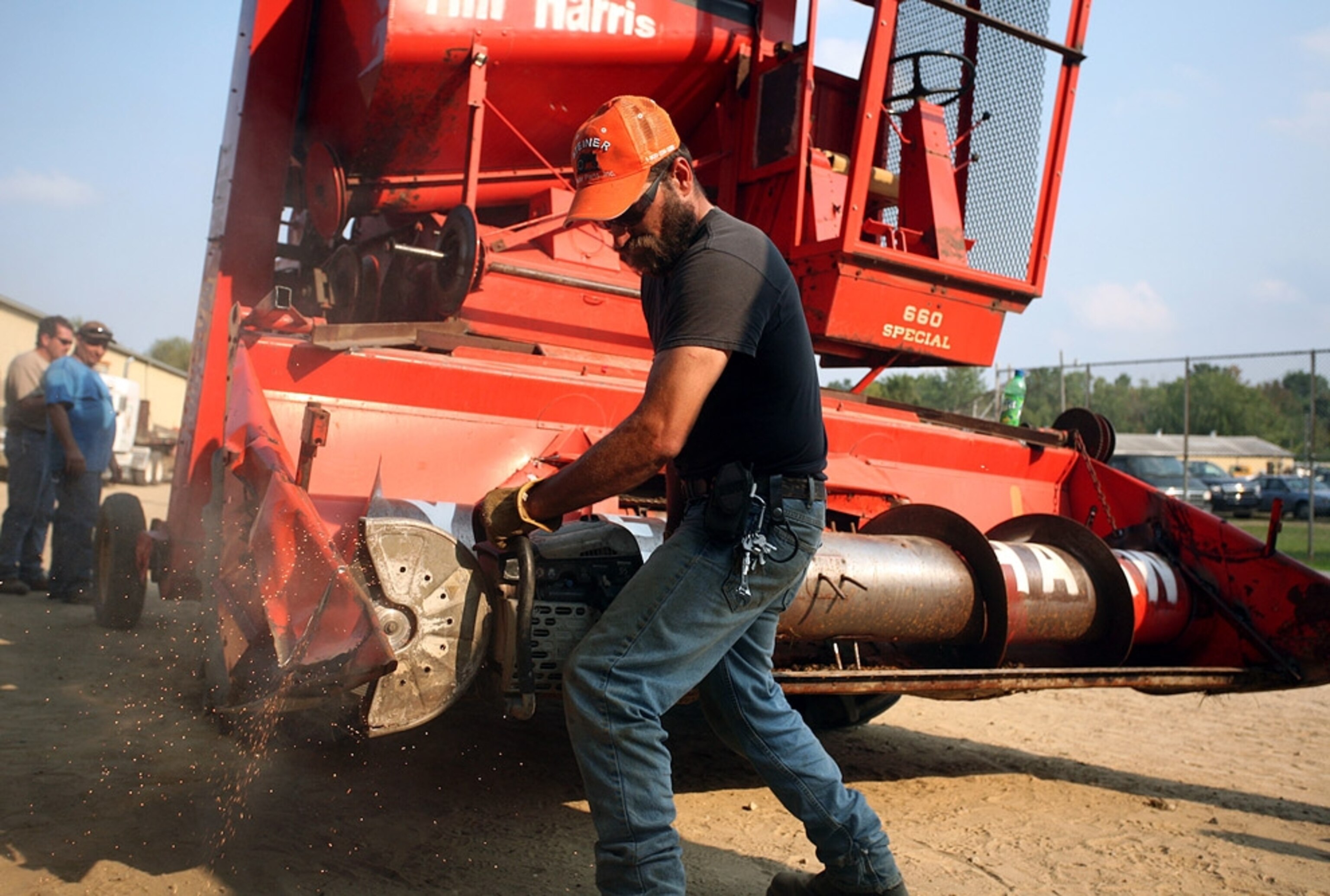 A man adjusting machinery