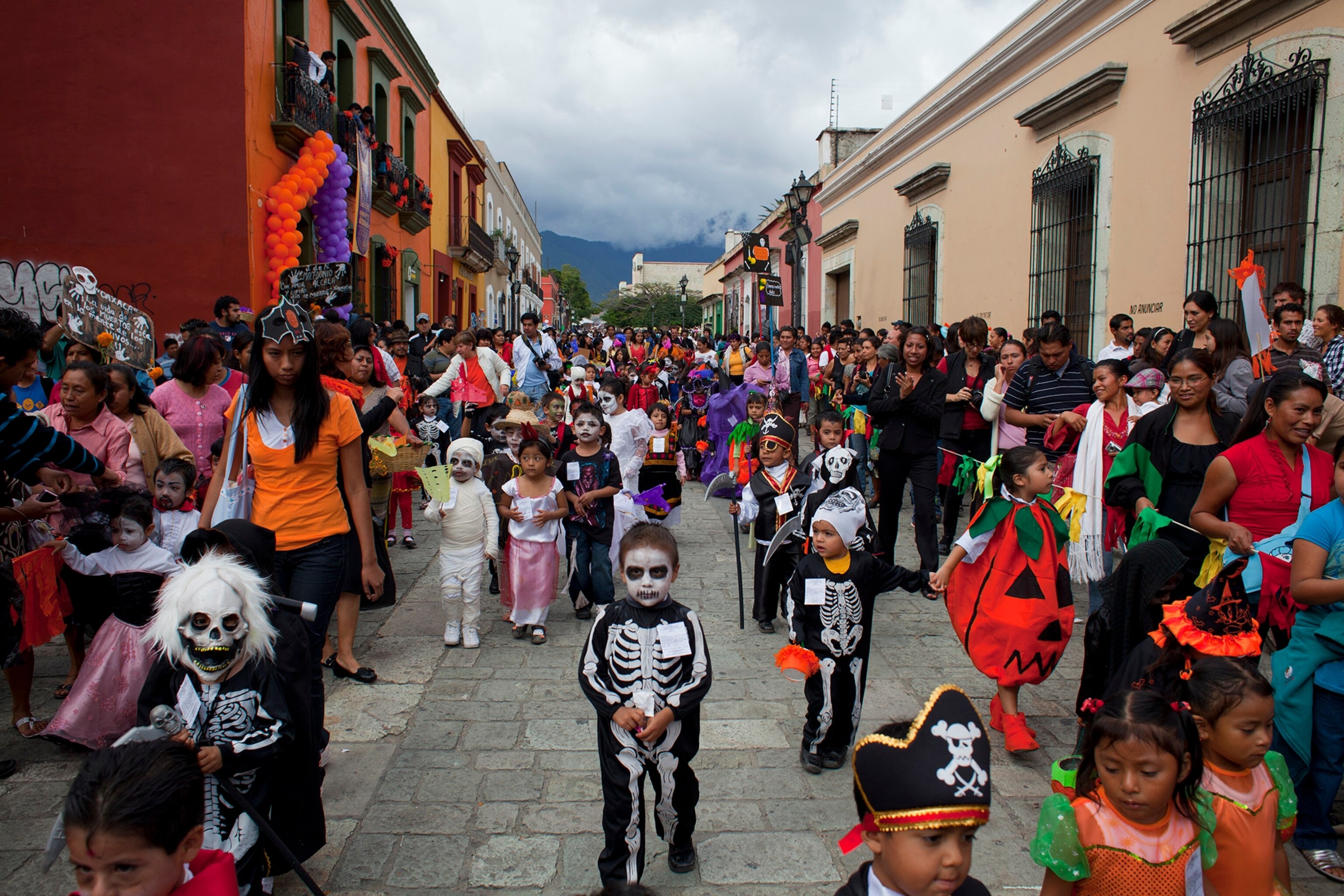Parade of children during Day of the Dead in Oaxaca, Mexico in 2010.
