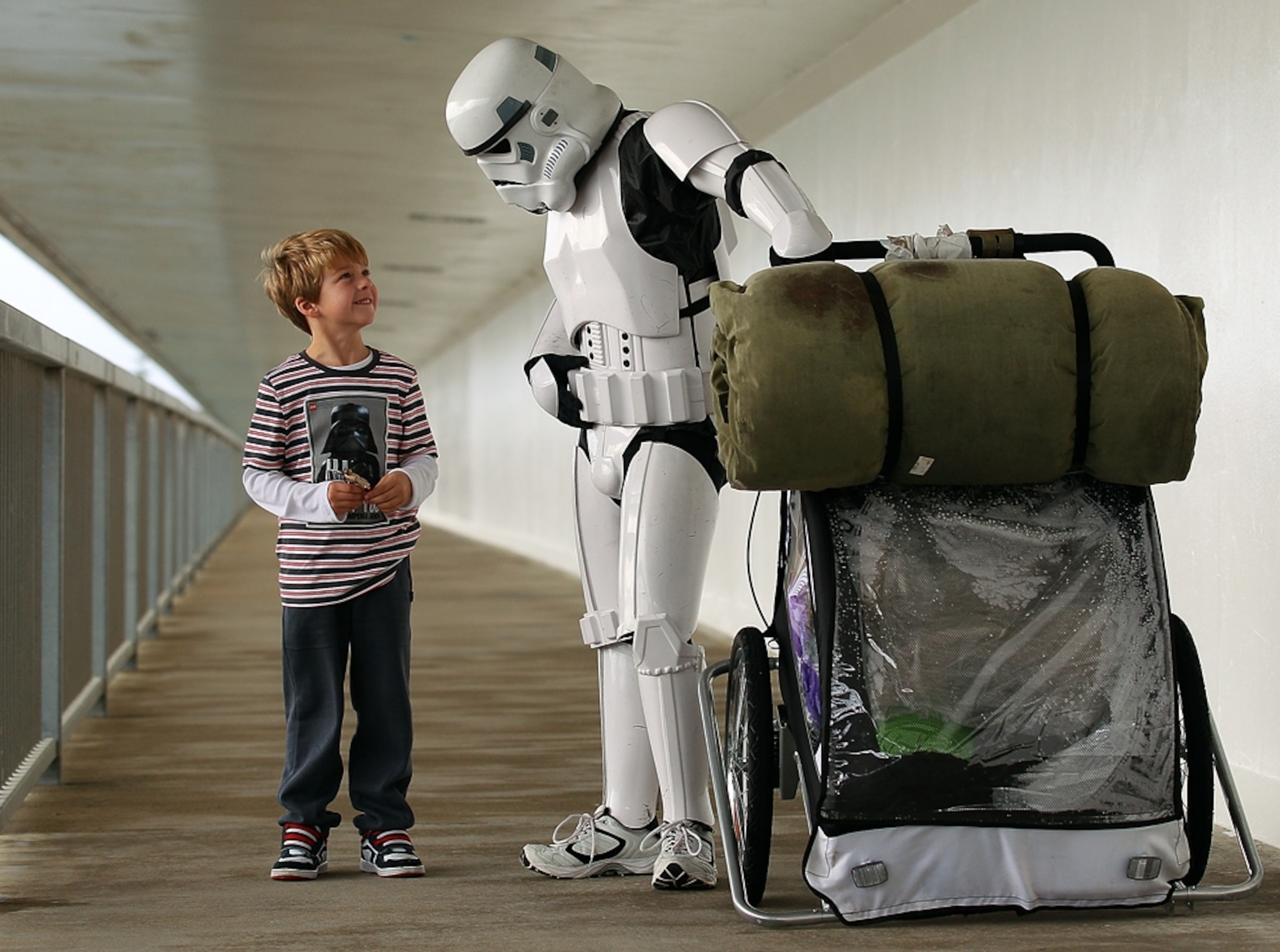 Stormtrooper picture: Costumed Star Wars fan walks to raise money for charity, meets boy on the way - for photo gallery of best pictures of July