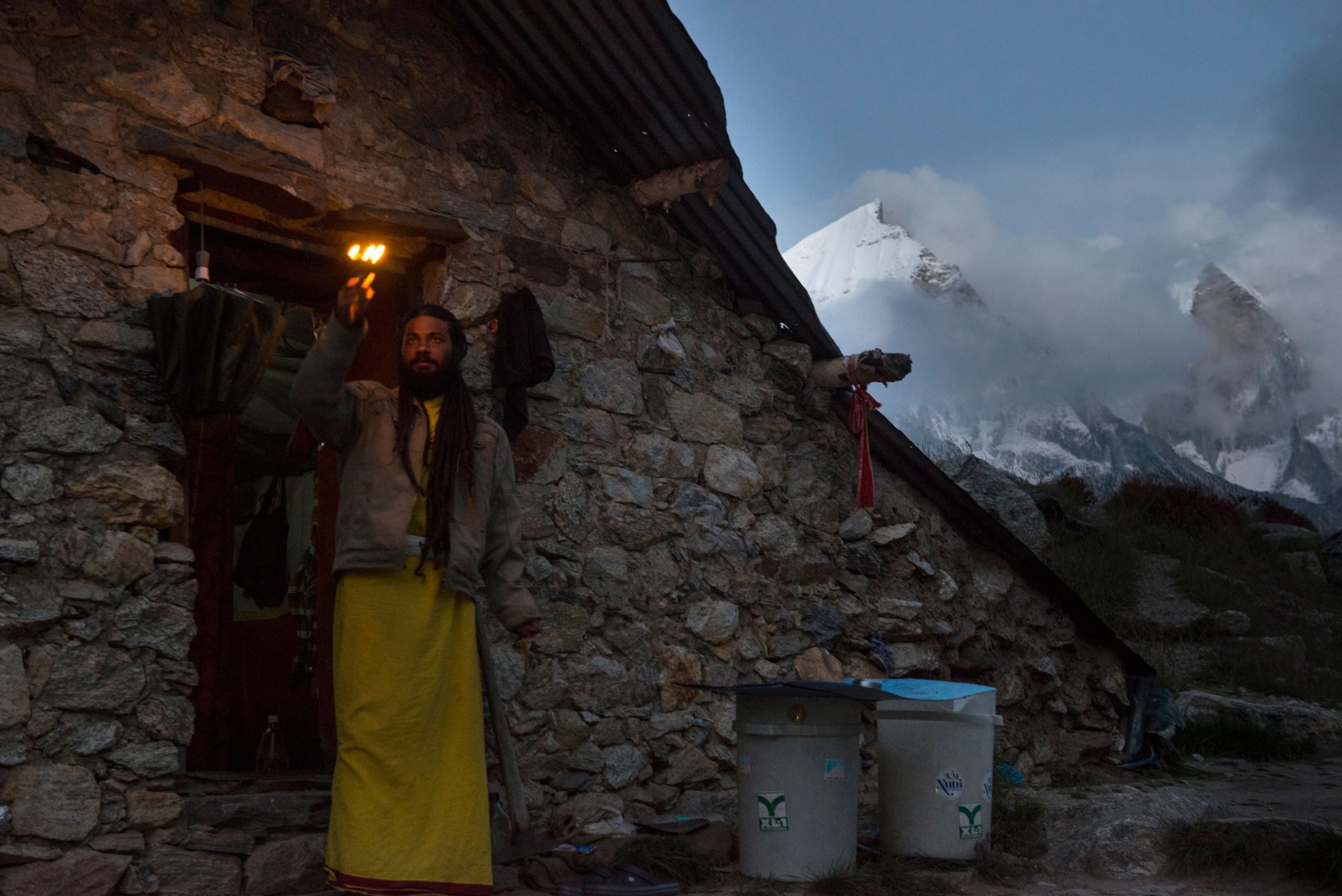 Silent Baba is a sadhu who has chosen not to speak for seven years. He lives in a humble stone ashram above Tapovan Creek, at 14,200 feet, in the shadow of the Bhagirathi mountains behind. Like many Hindu, he believes the Ganges is more sacred at its headwaters.