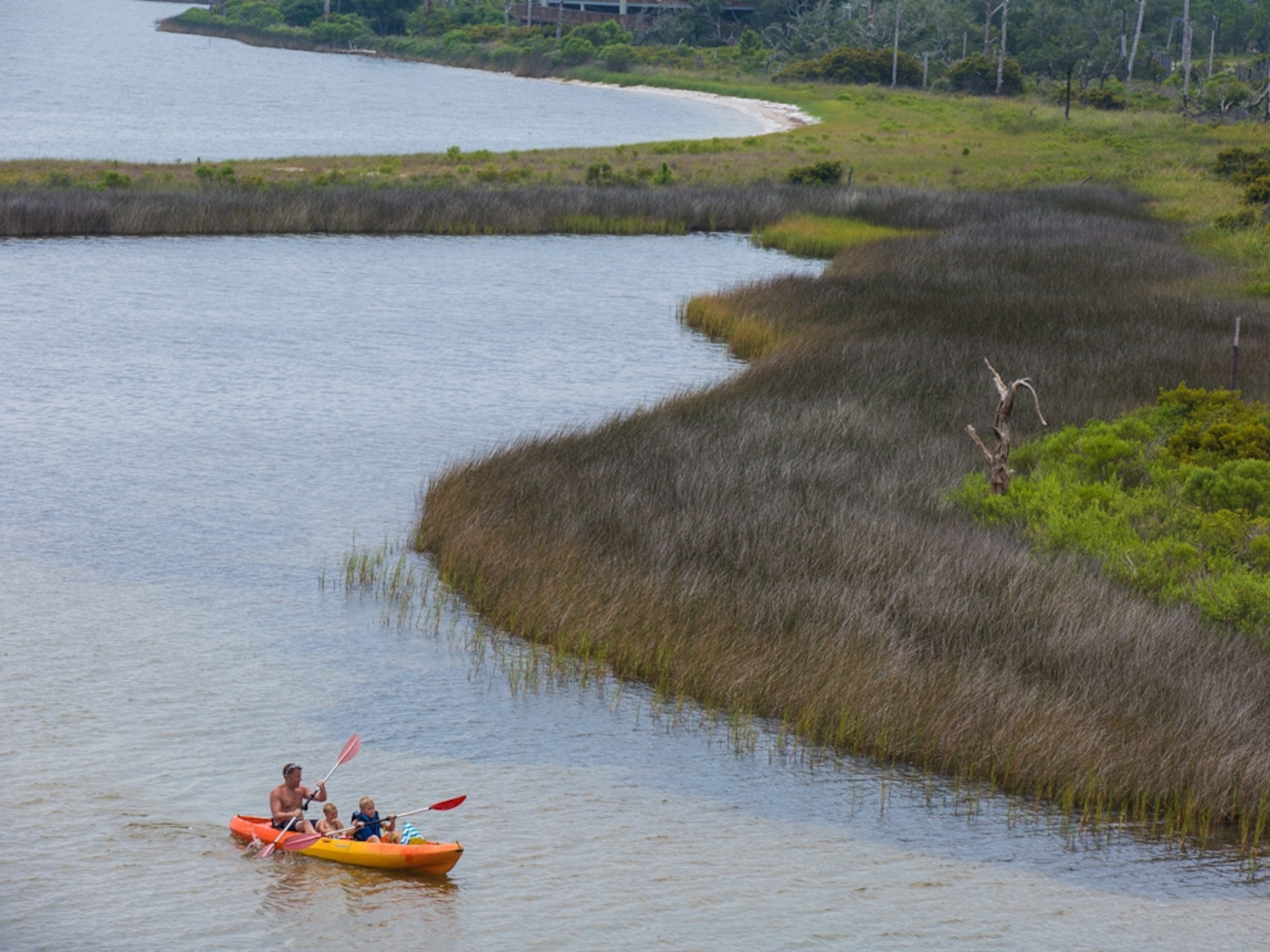 kayakers in the waters off of Big Lagoon State Park, Florida