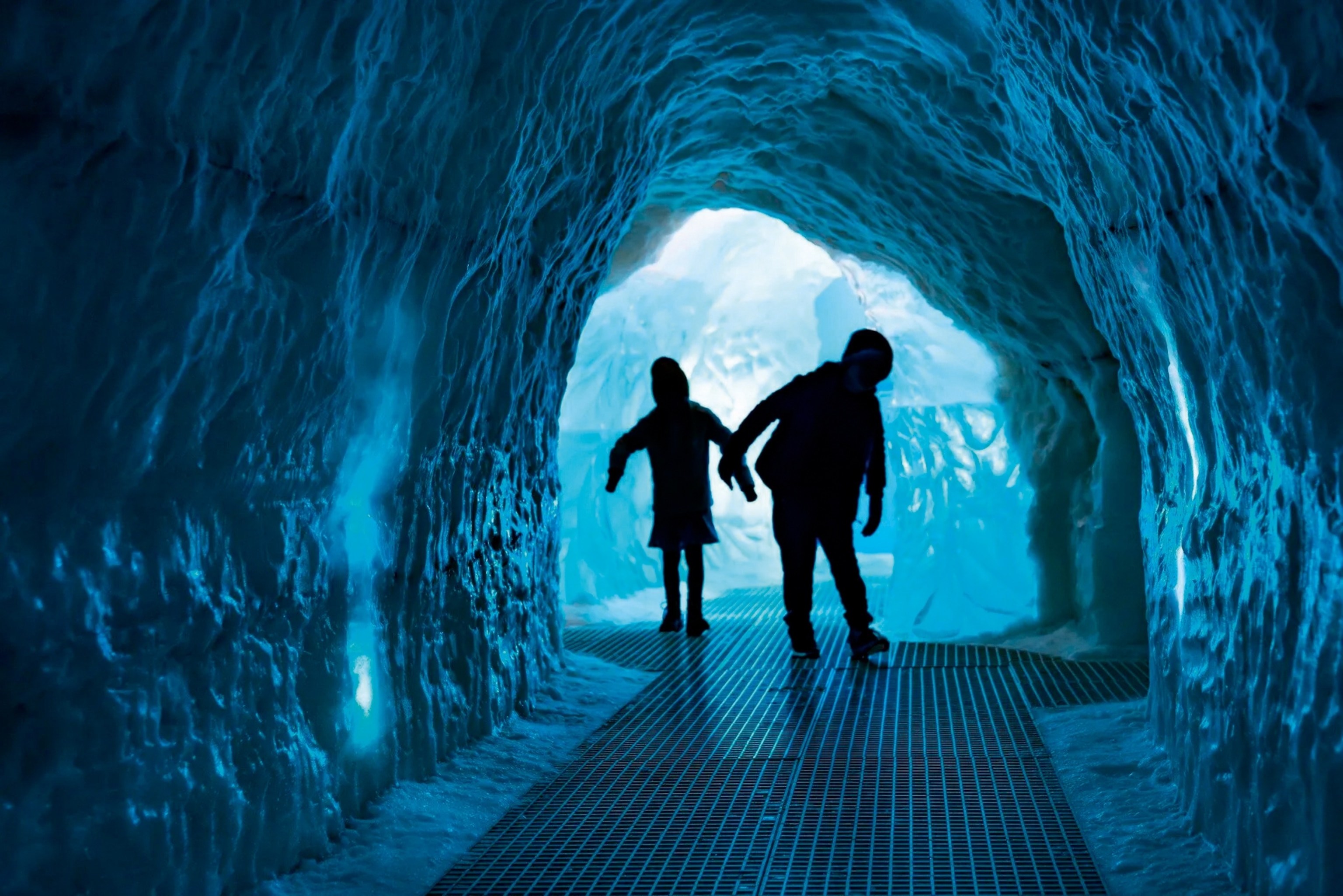 Two children in a recreated cave at Perlan, Reykjavík’s premier science museum