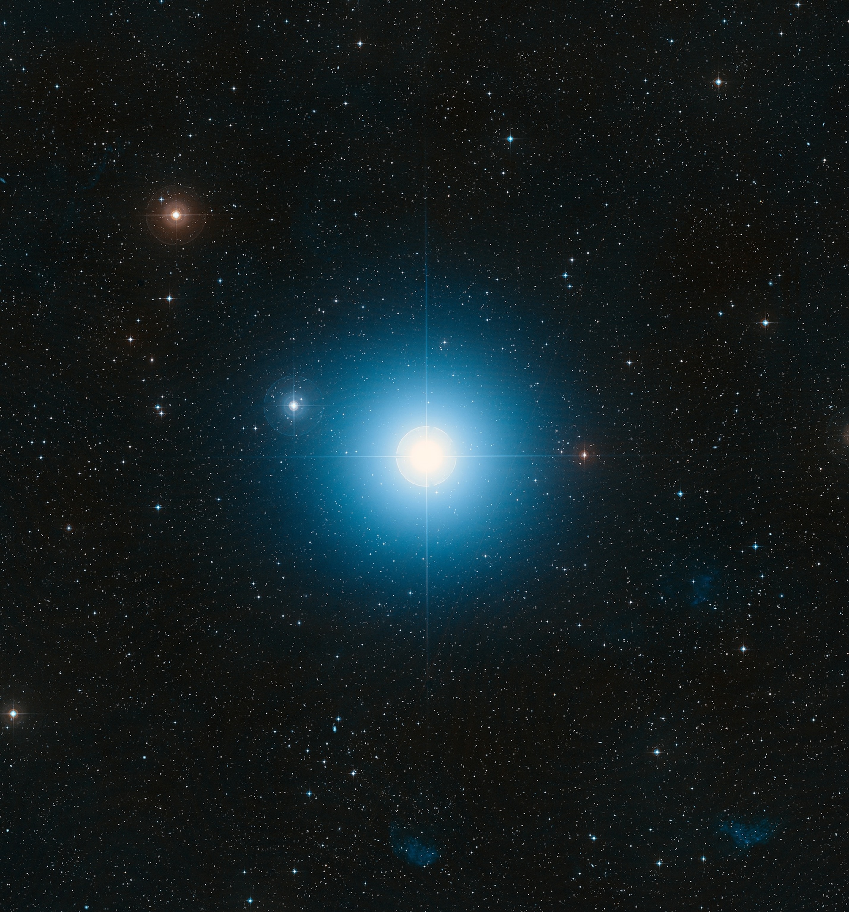 Wide-field view of the star Fomalhaut against a dense field of stars in the night sky.