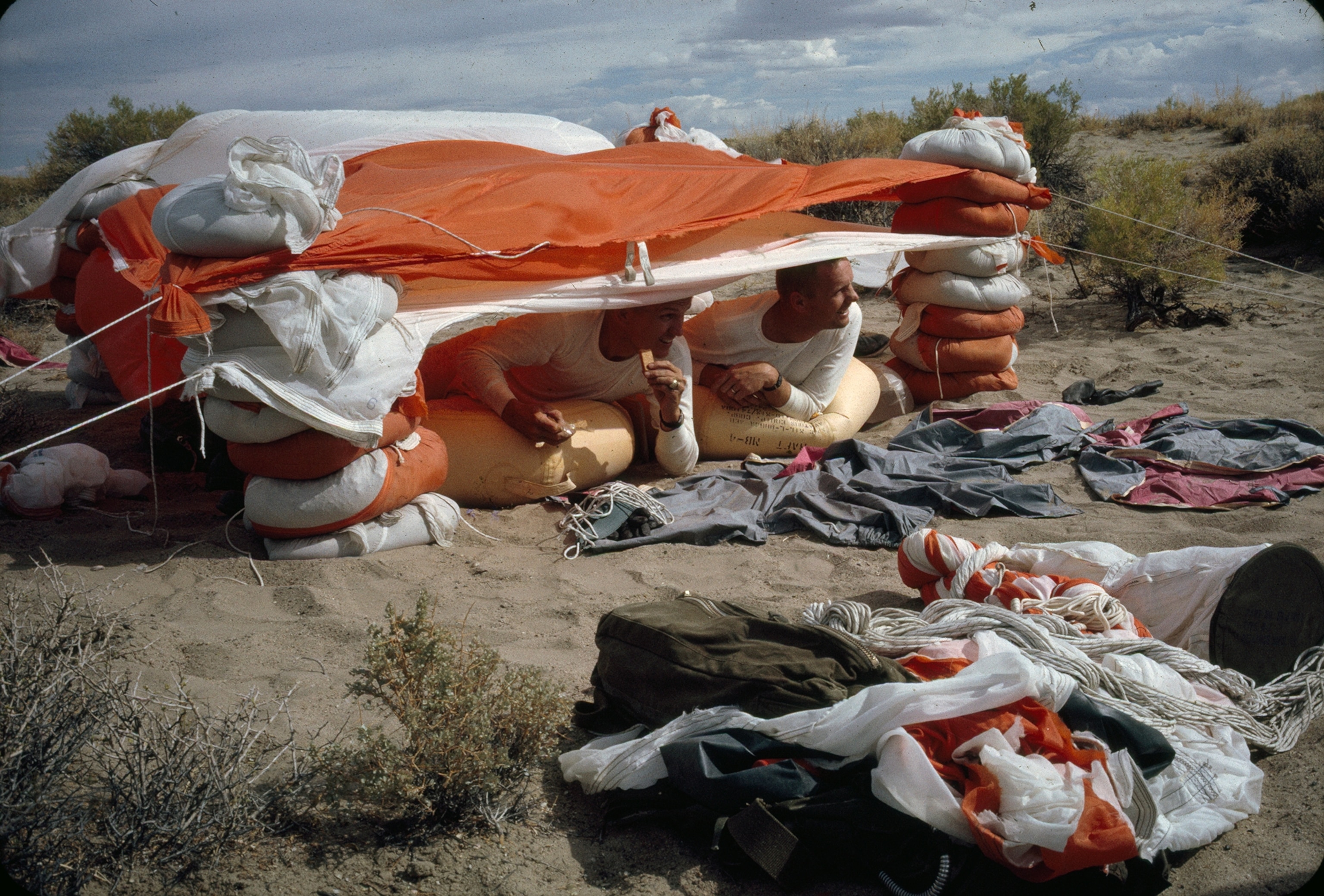 Astronauts practice desert survival skills.