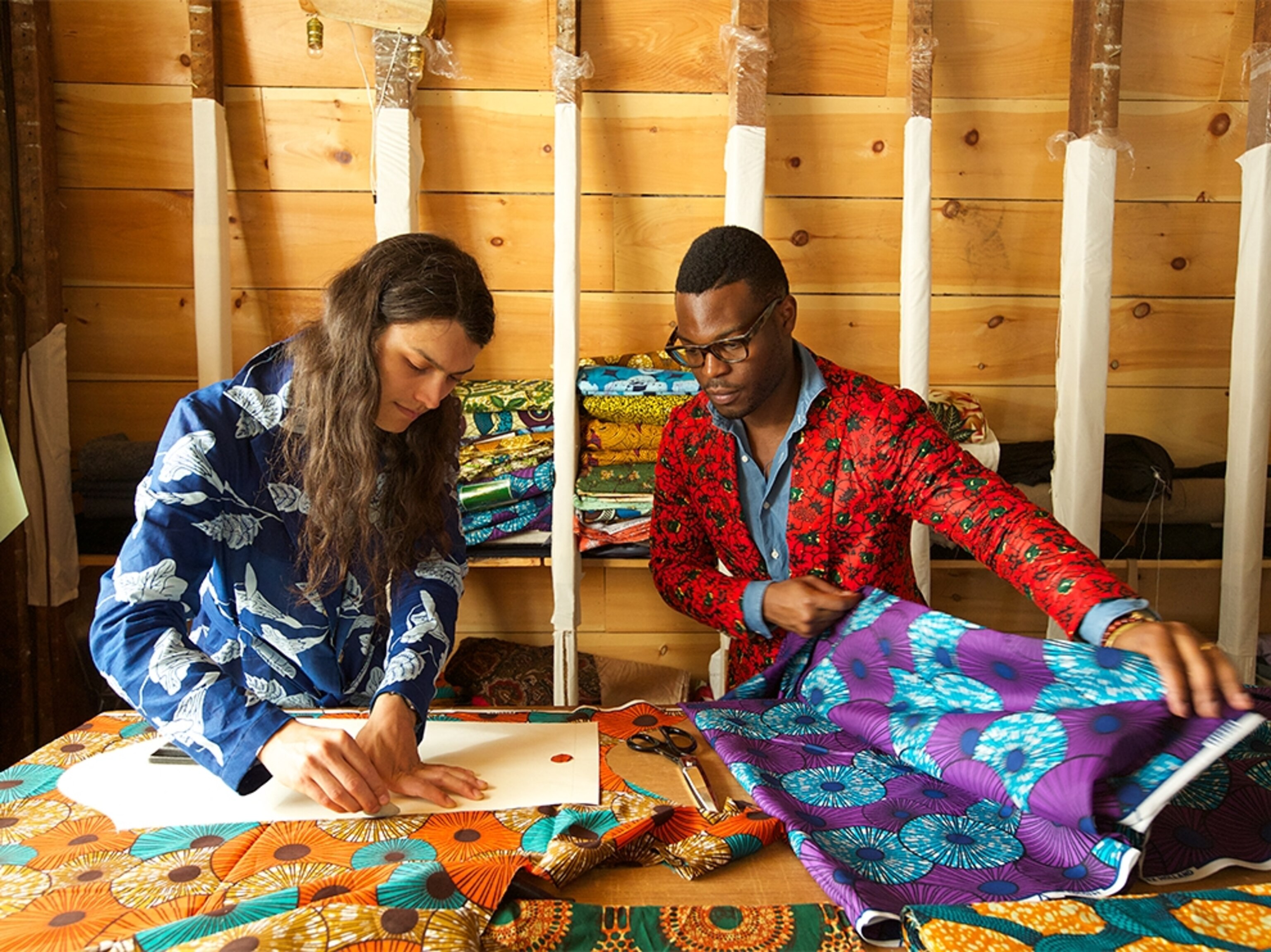 Wale Oyejide and Samuel Hubler working at their menswear shop in Philadelphia