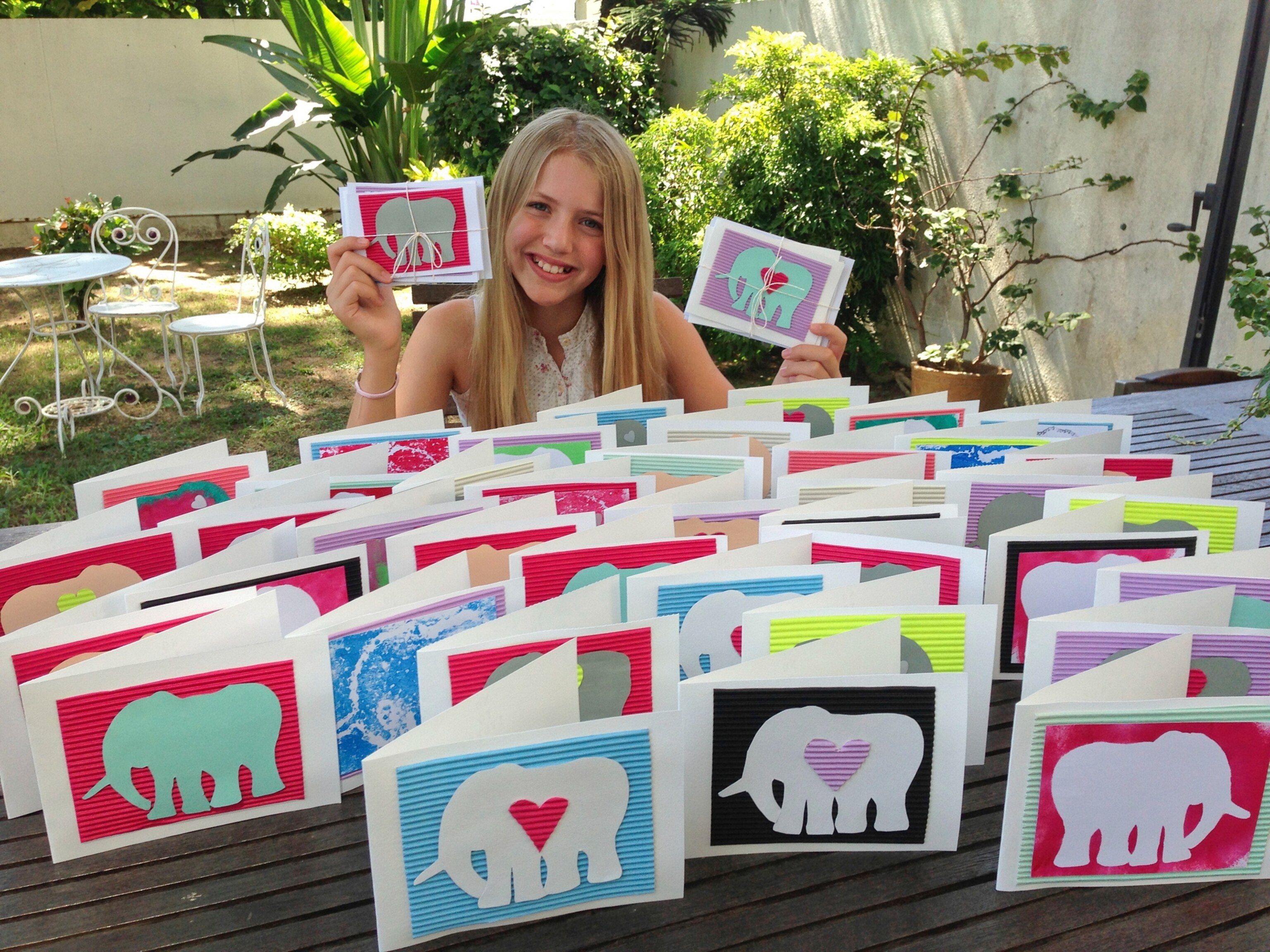 Nellie Shute with her homemade gift cards.